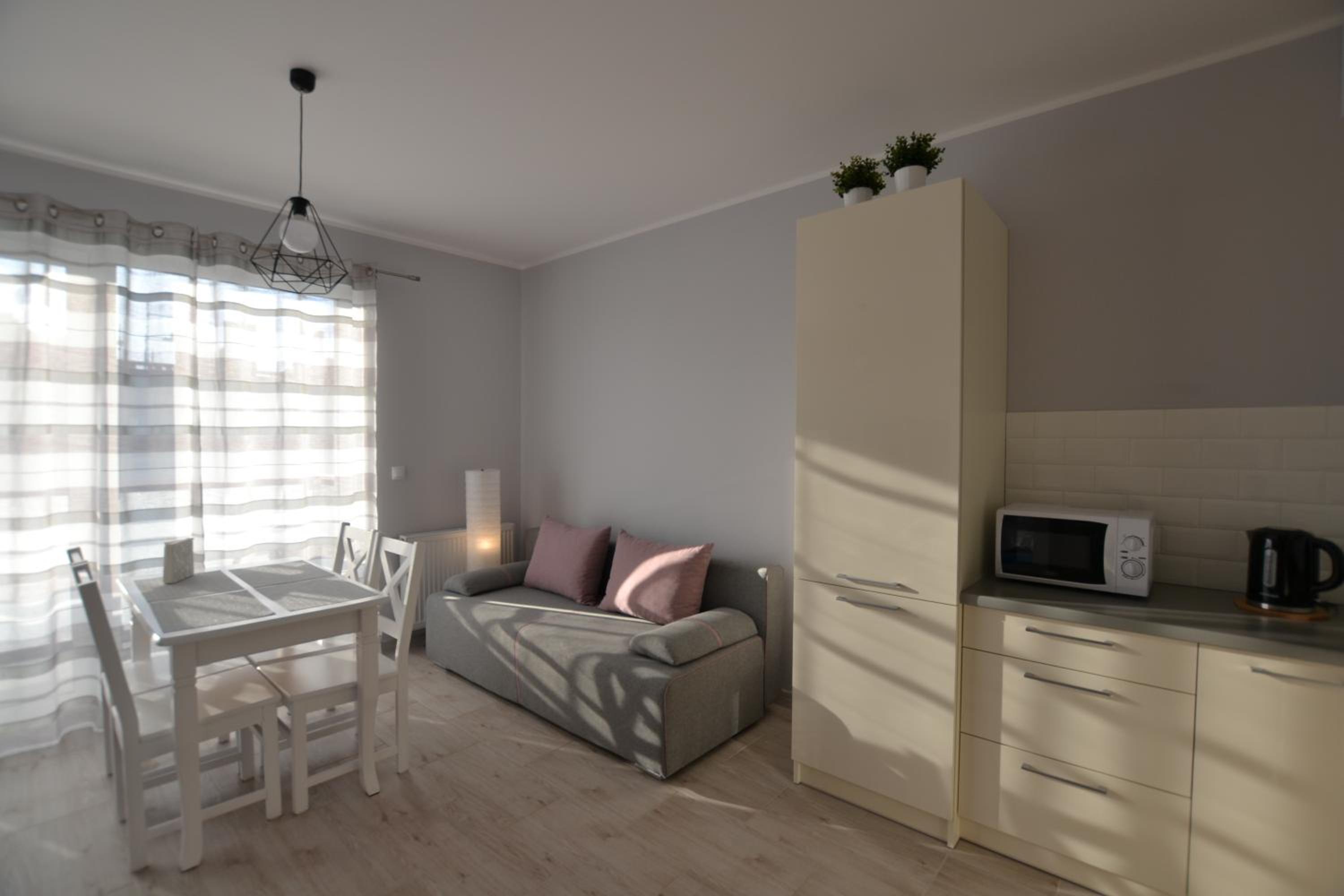 Apartment with Balcony - Photo 5