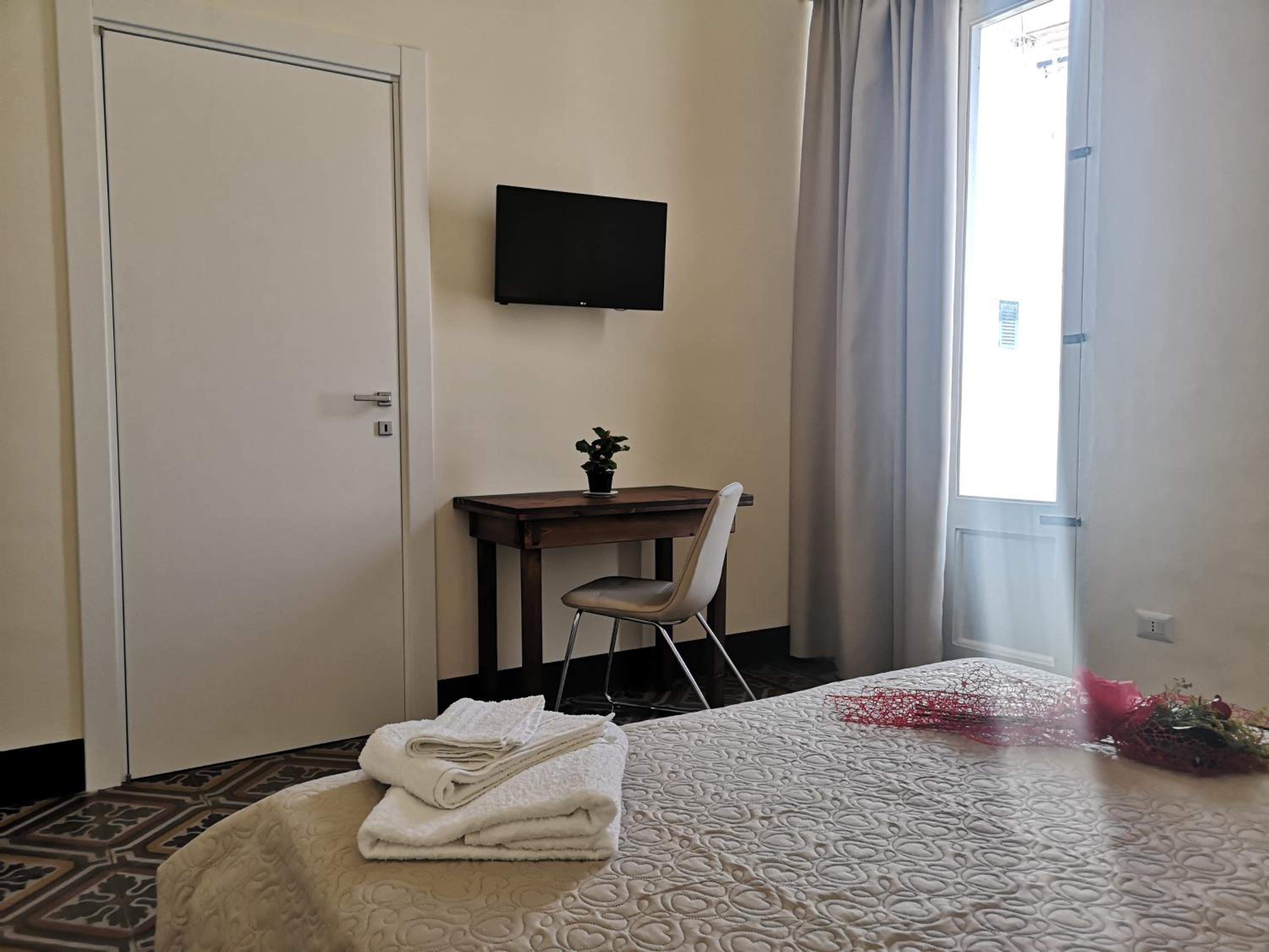 Deluxe Quadruple Room - Photo 6