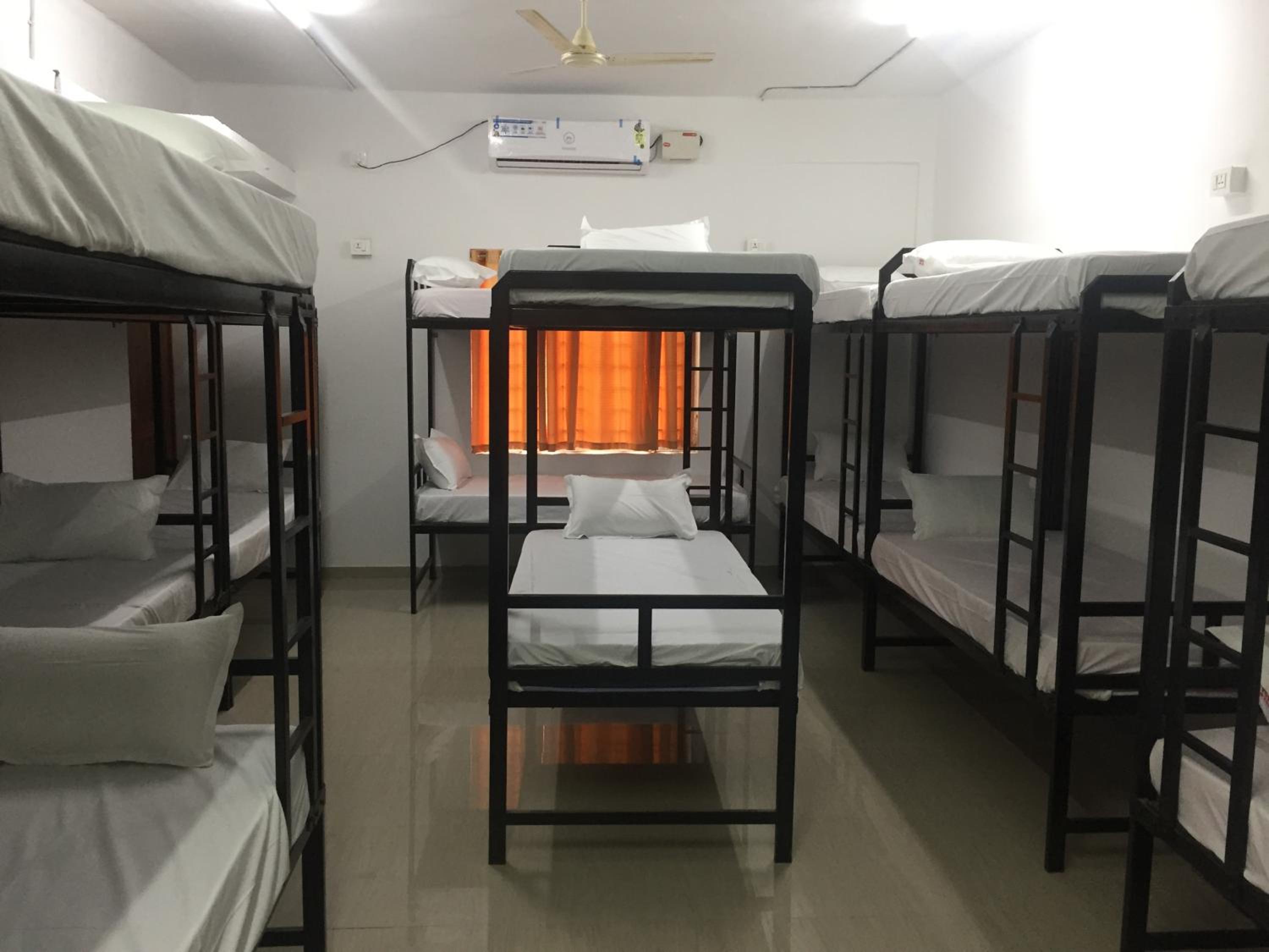 Single Bed in Male Dormitory Room with Shared Bathroom photo 1