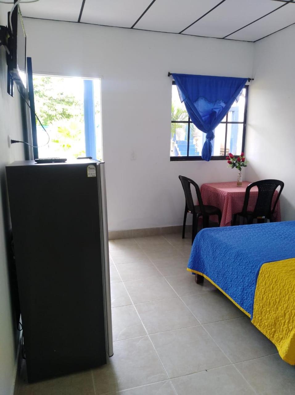 Economy Triple Room photo 2