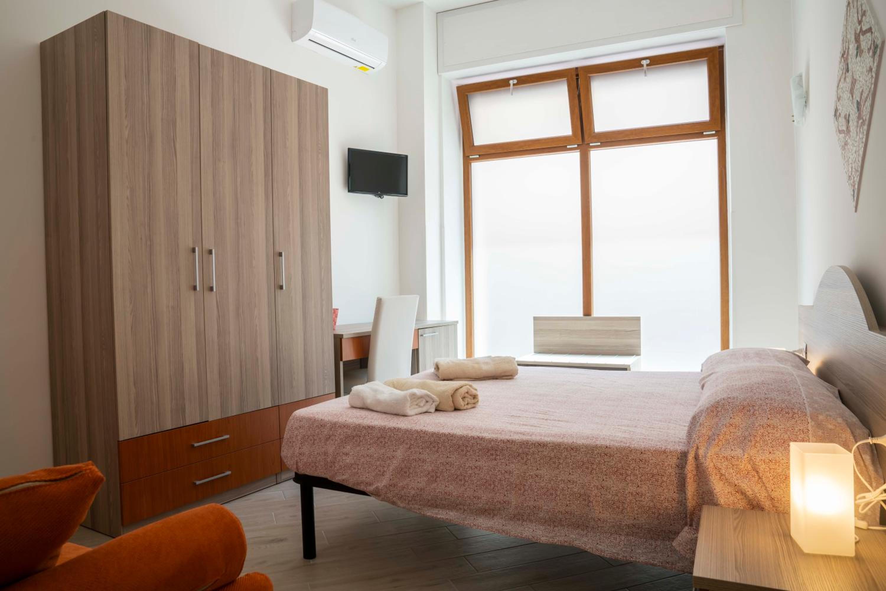 Quadruple Room with Private Bathroom