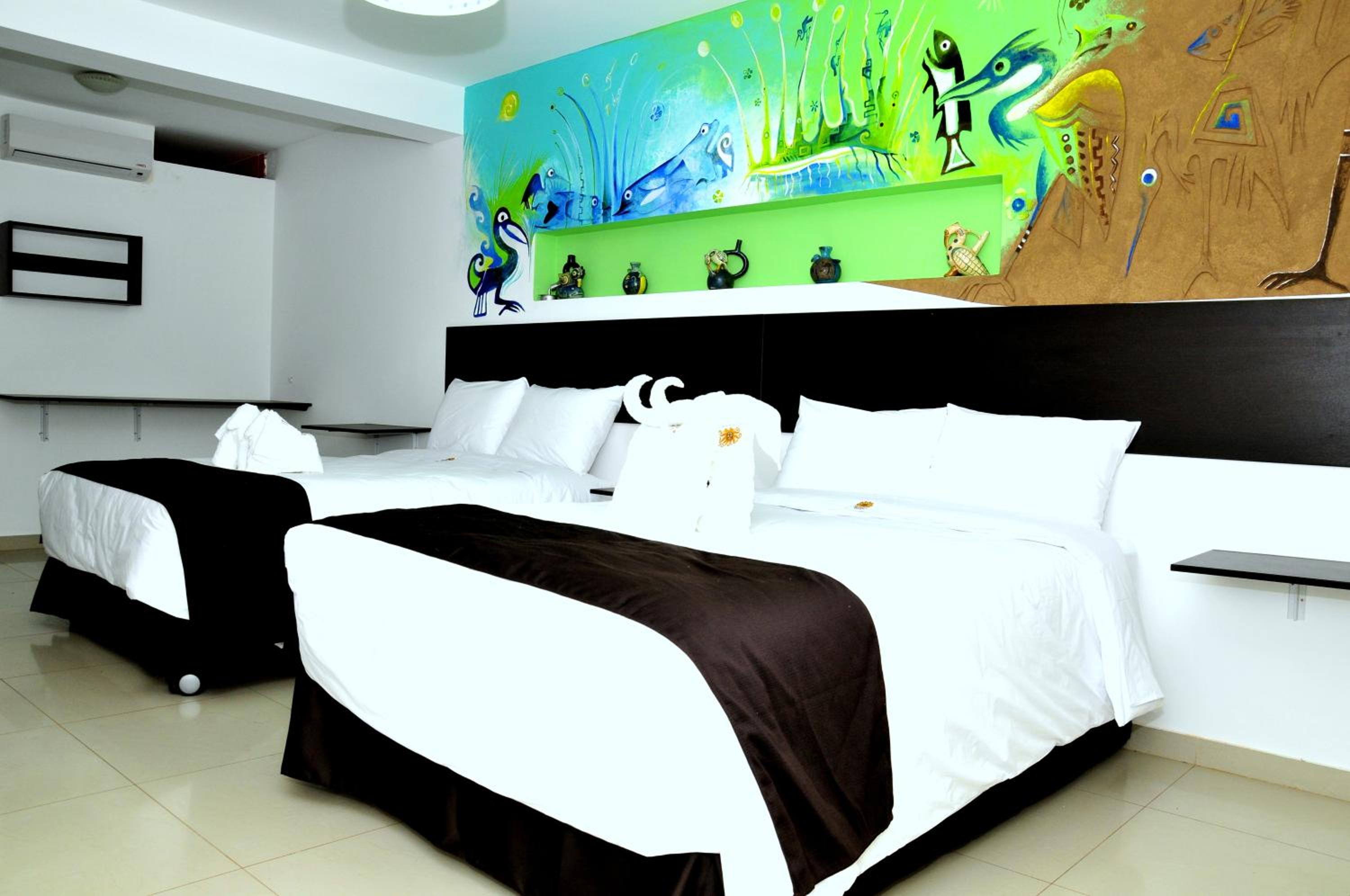 Junior Suite with Two Double Beds and Ocean View photo 1