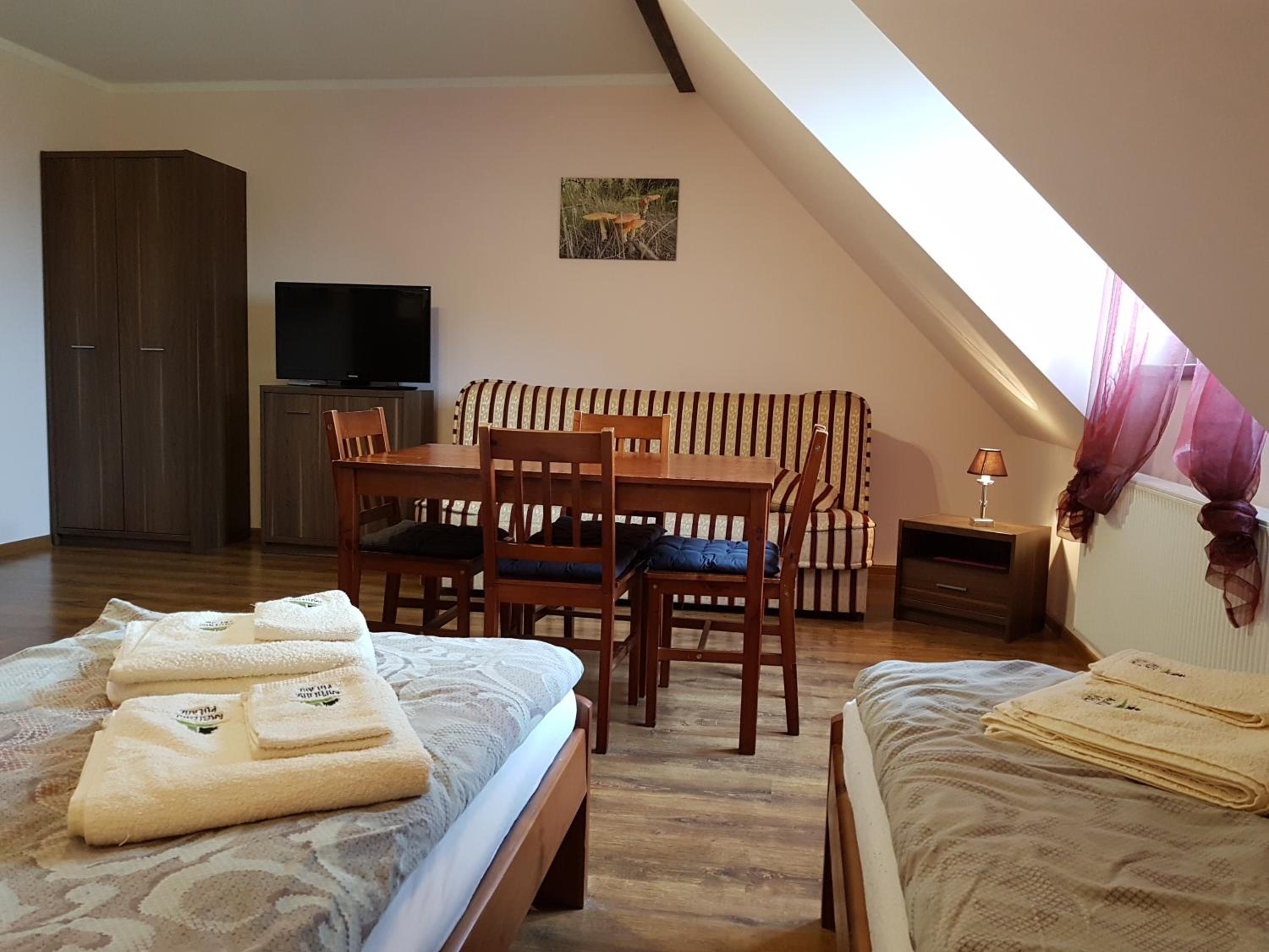Quadruple Room with Private Bathroom photo 2