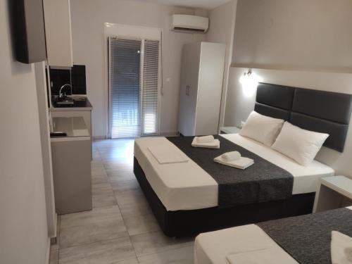 Deluxe Triple Room - Photo 7