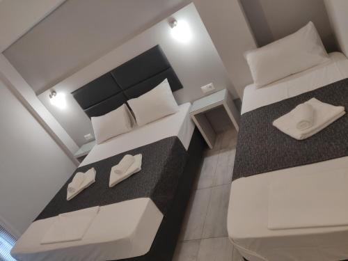 Deluxe Triple Room - Photo 9