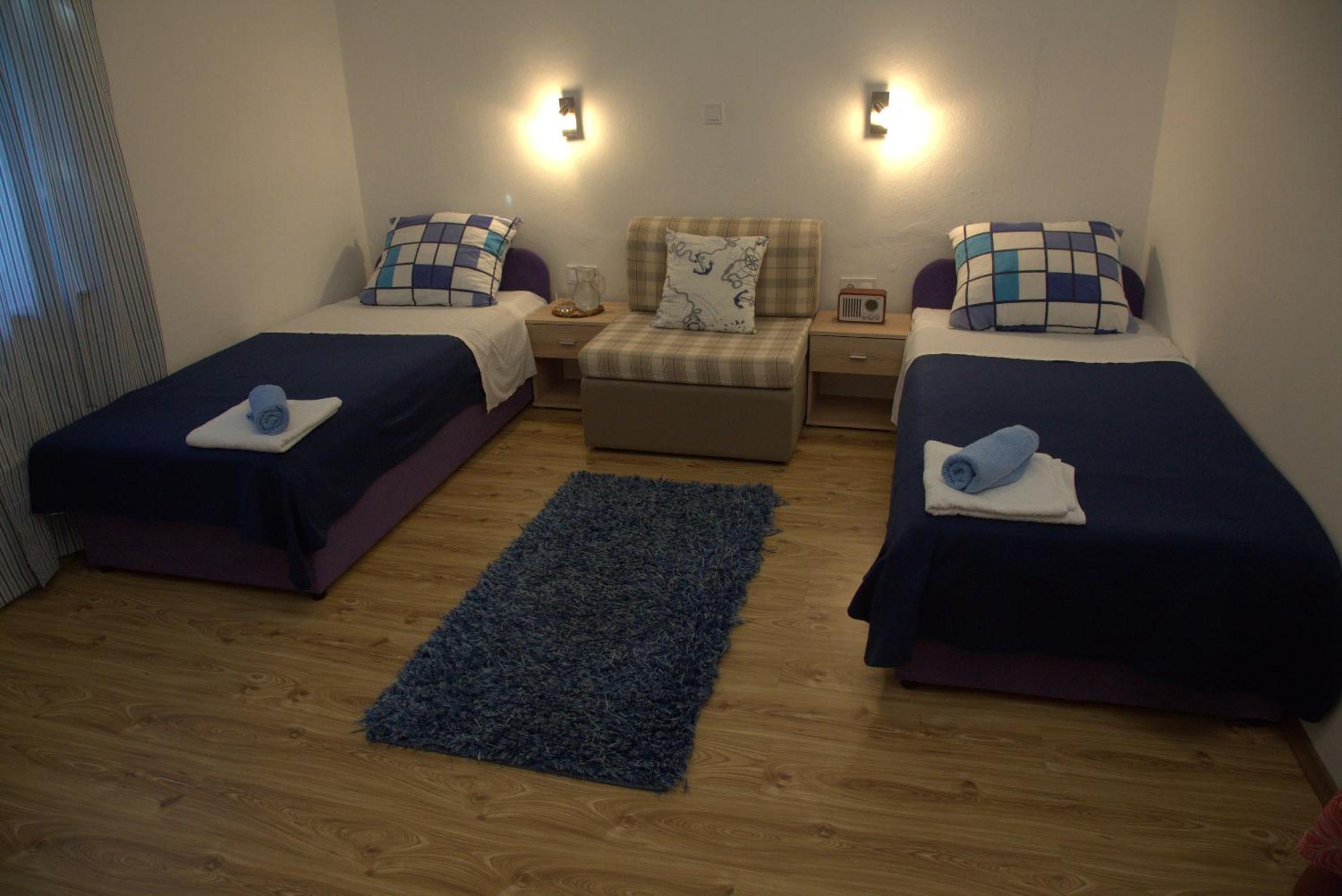 Three-Bedroom Apartment photo 1