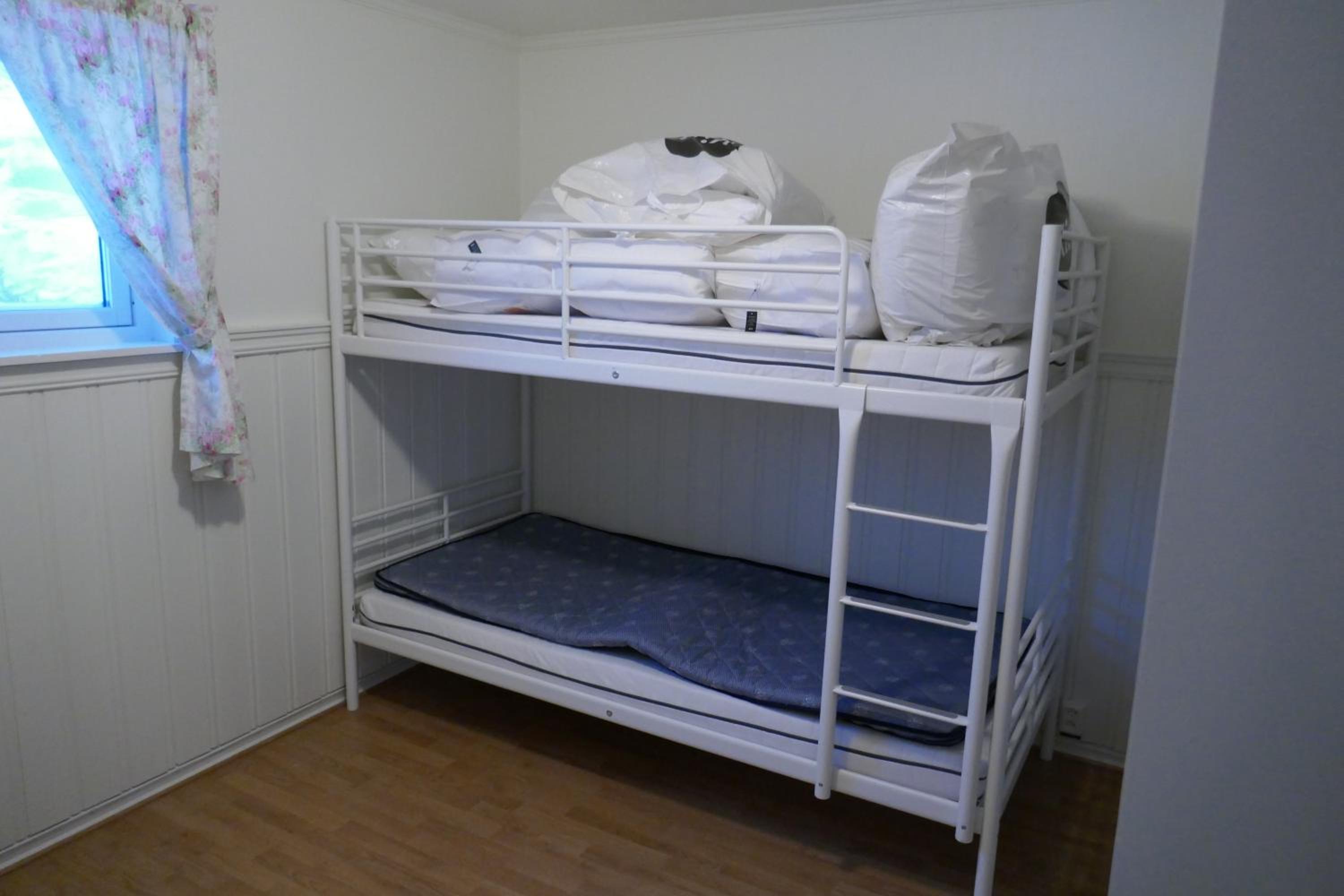 Three-Bedroom House - Photo 29