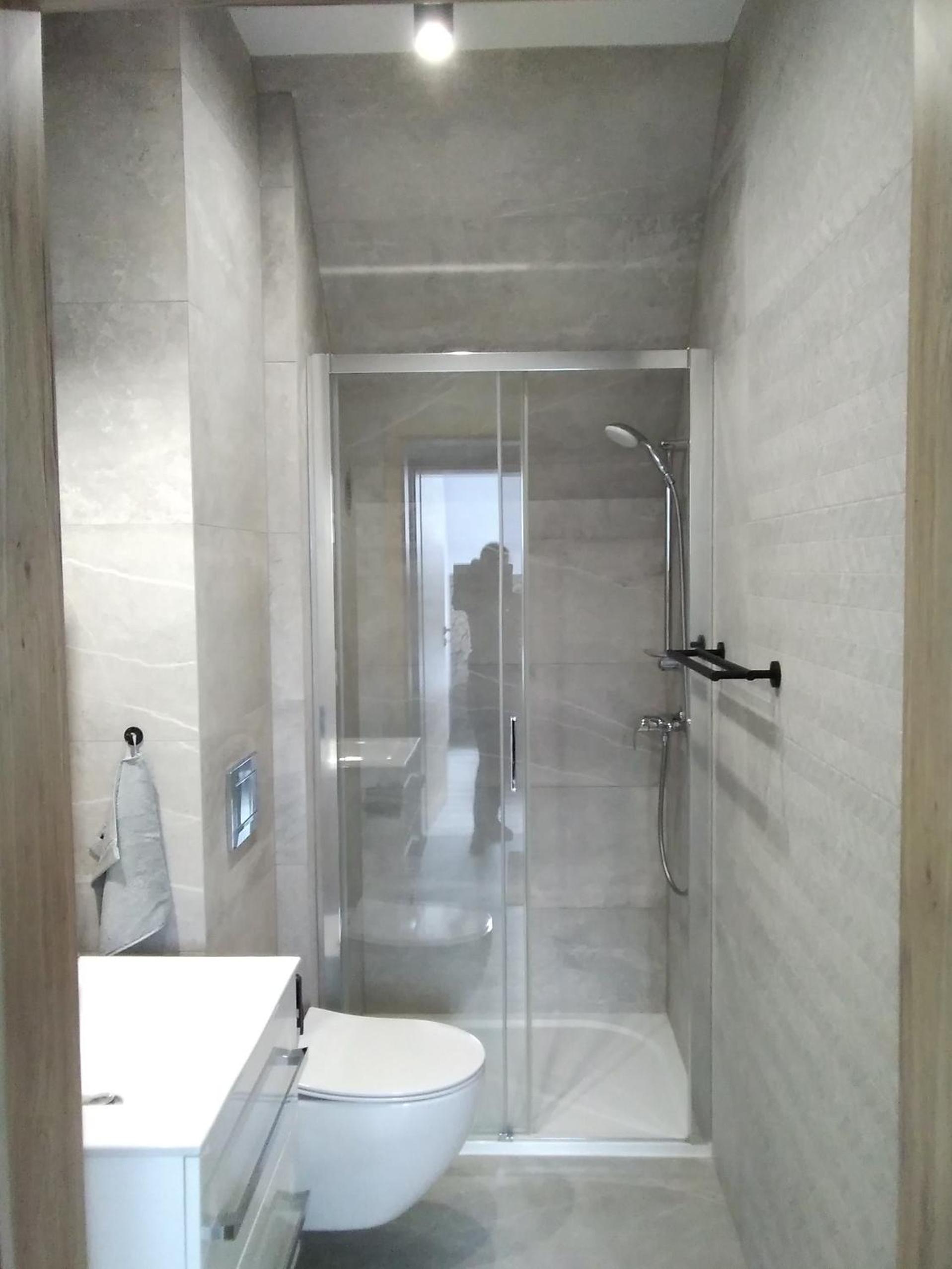 Three-Bedroom Apartment - Photo 41