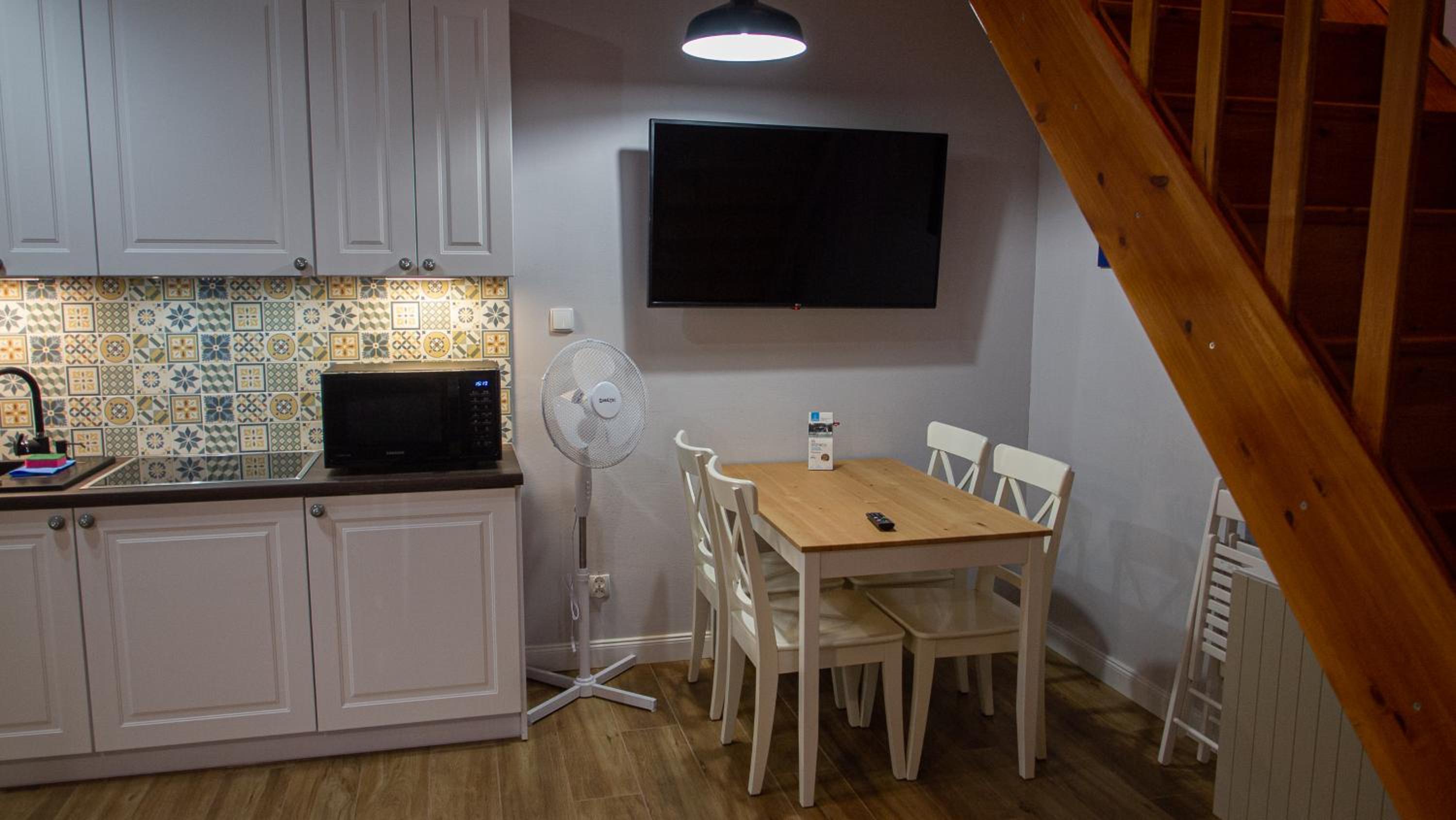 One-Bedroom Apartment with Mezzanine photo 1