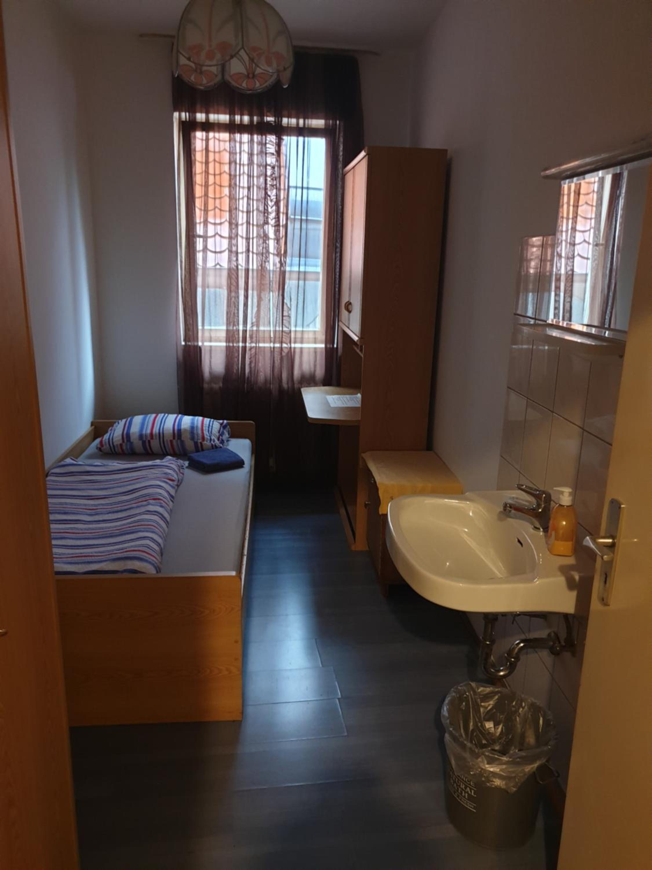 Single Room with Shared Shower and Toilet