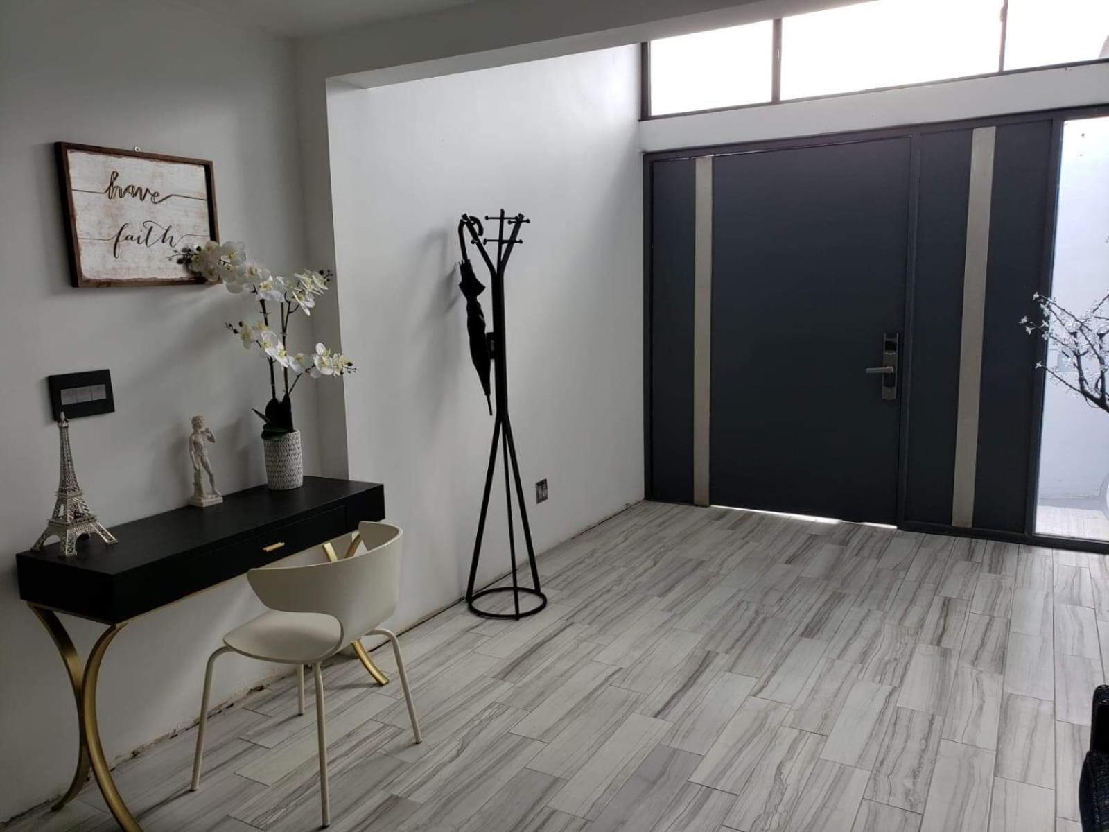 Three-Bedroom House - Photo 2