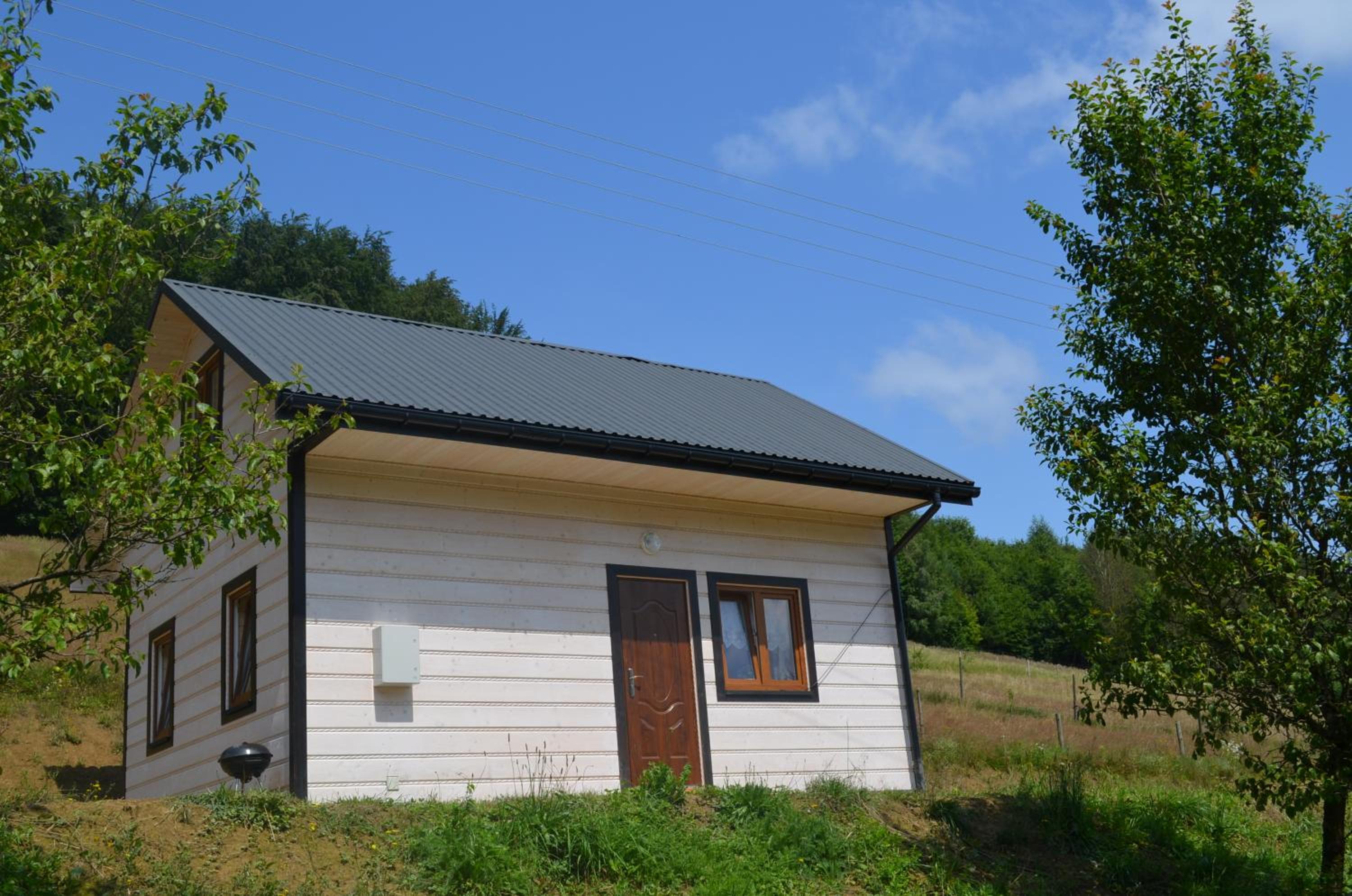 Three-Bedroom House - Photo 2