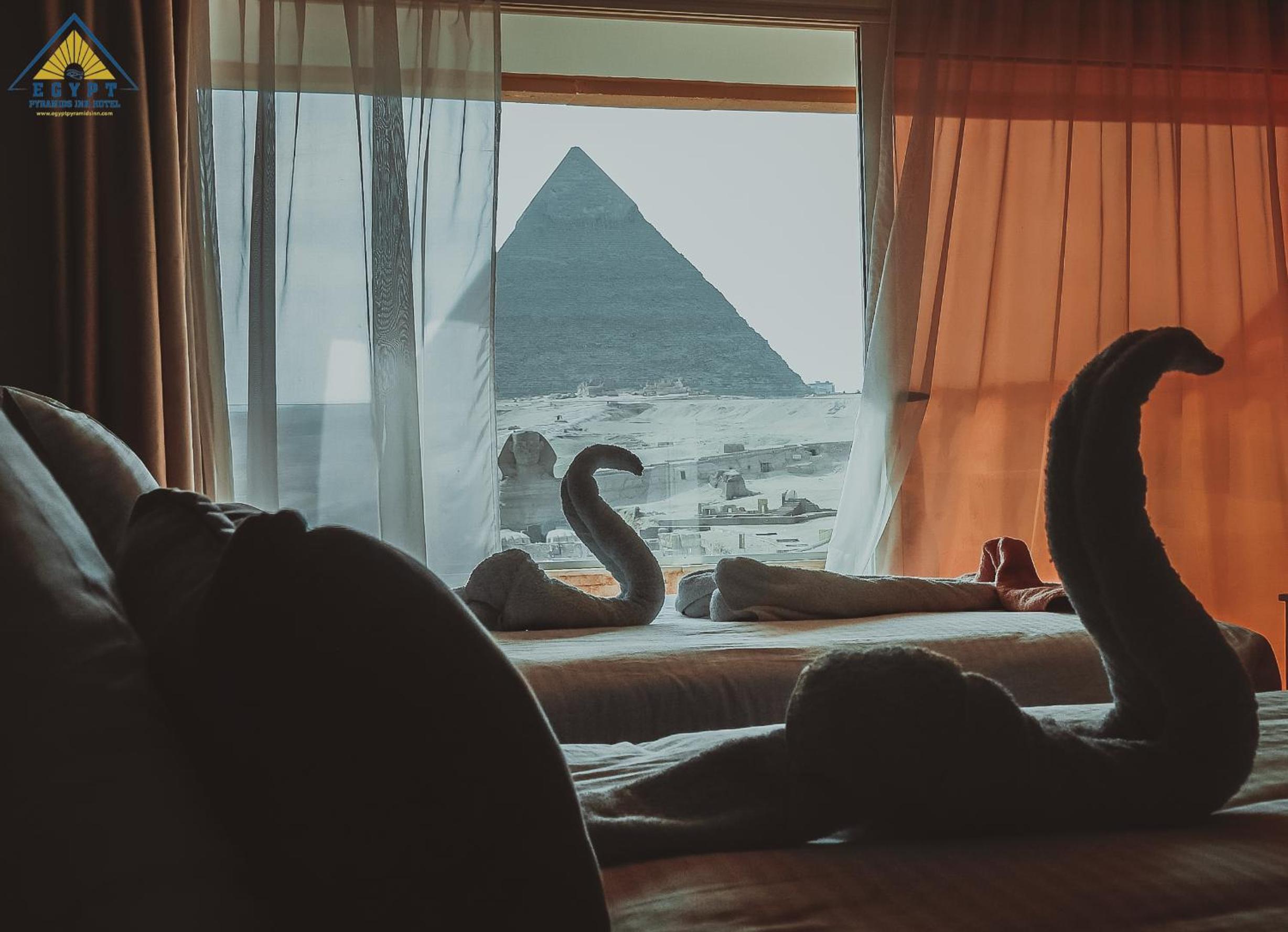 Family Room with Balcony and Pyramid View - Photo 6