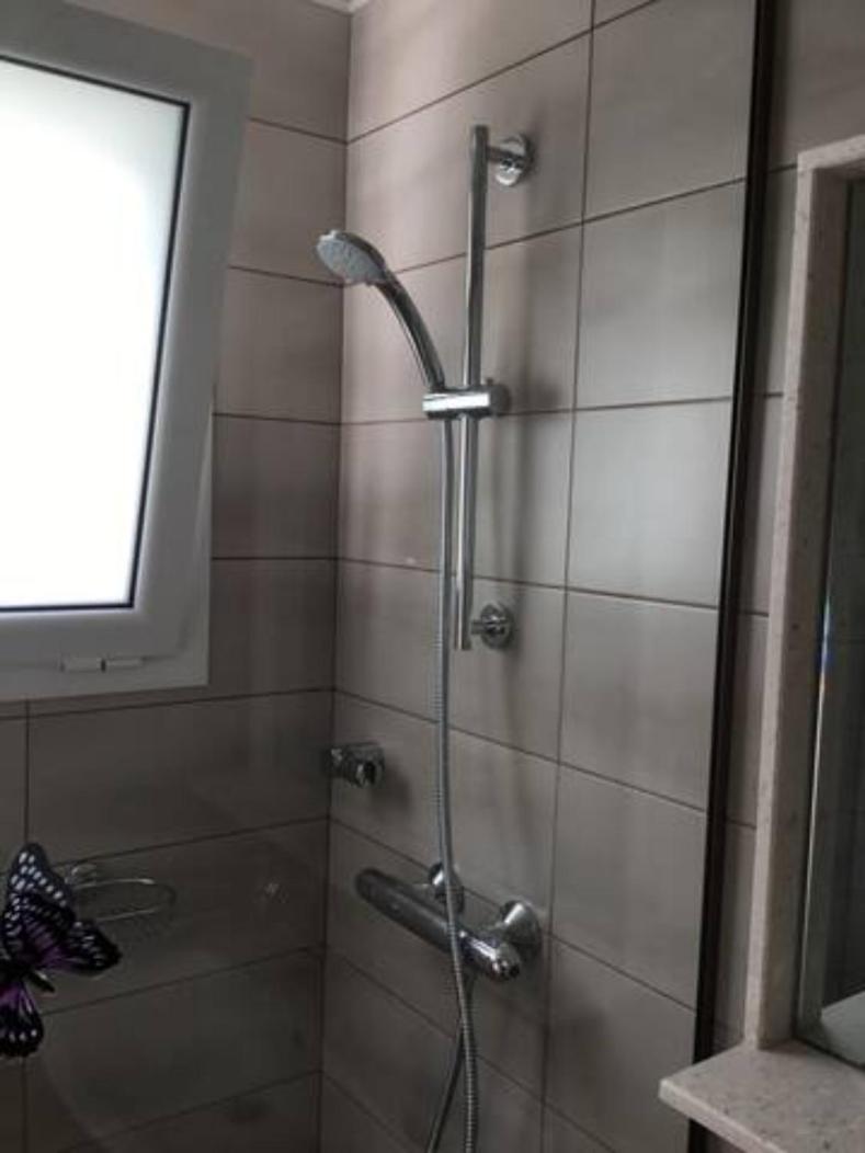 Three-Bedroom House - Photo 18