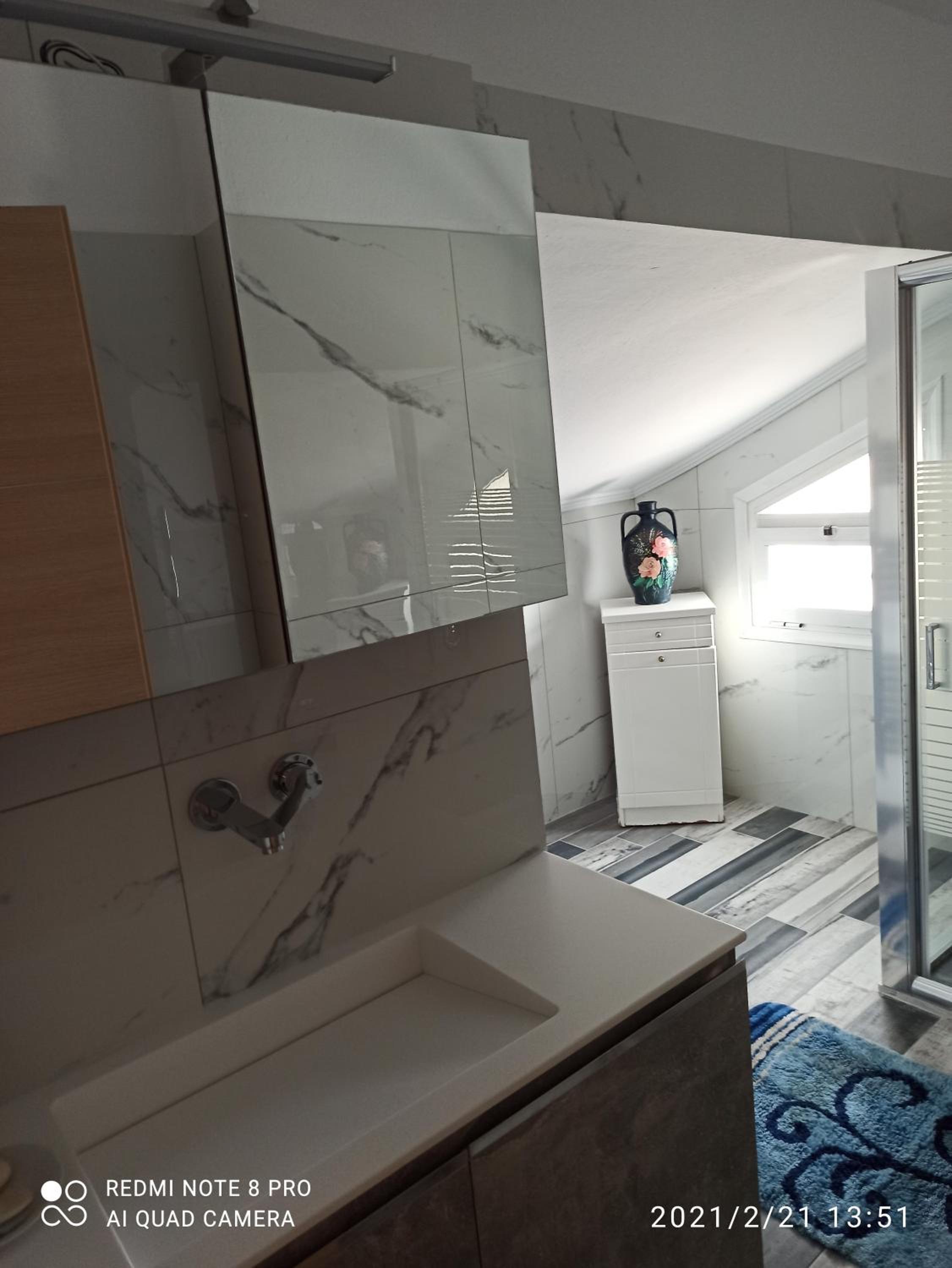 Three-Bedroom Apartment - Photo 55