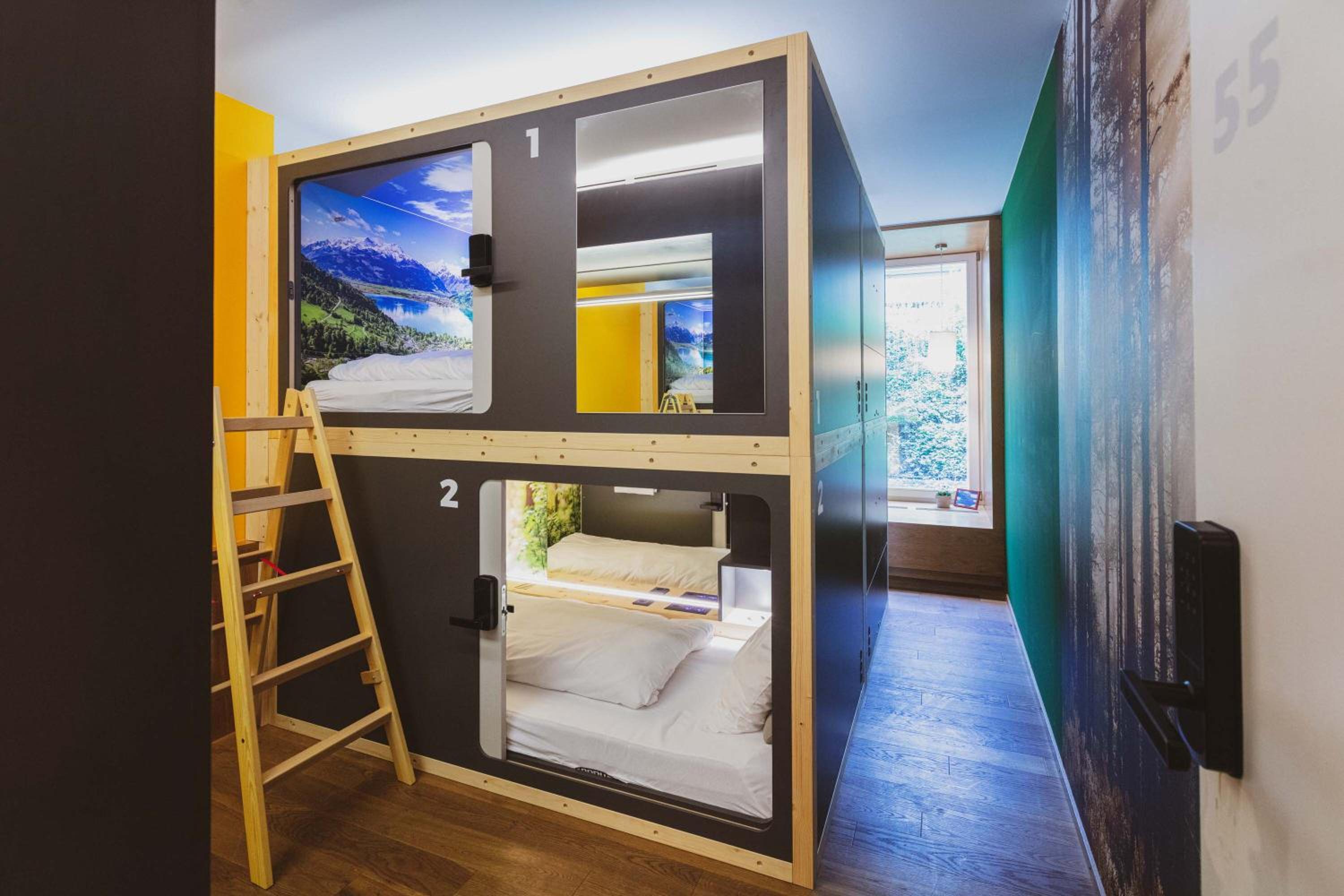 Bed in Swiss Relax Capsule TM with shared bathroom