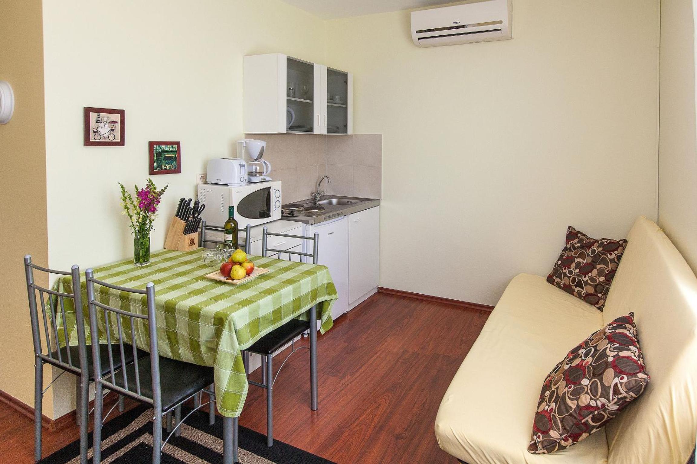 One-Bedroom Apartment with Balcony and Sea View