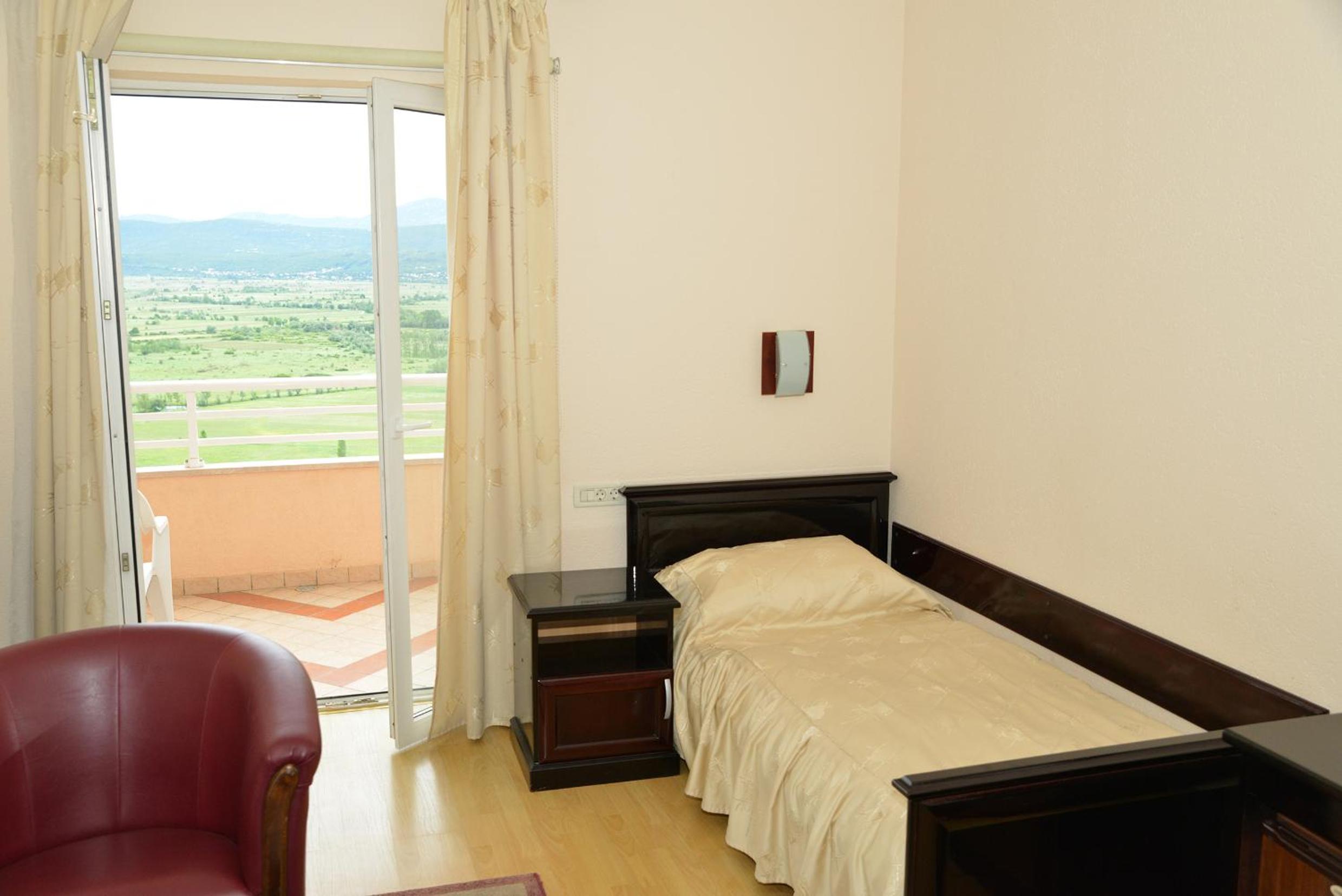 Deluxe Single Room with Balcony photo 2