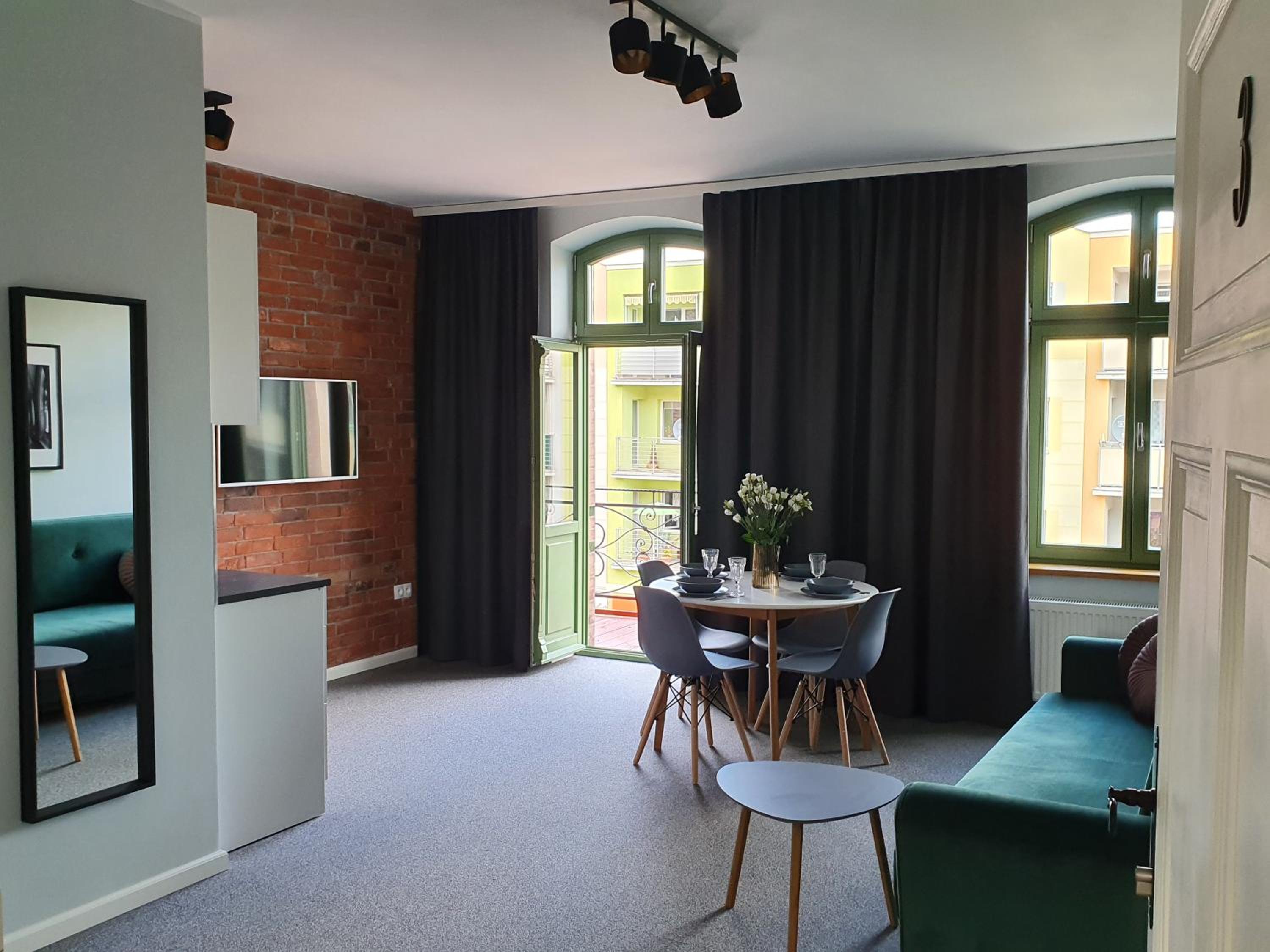 Apartment with Balcony - Photo 1