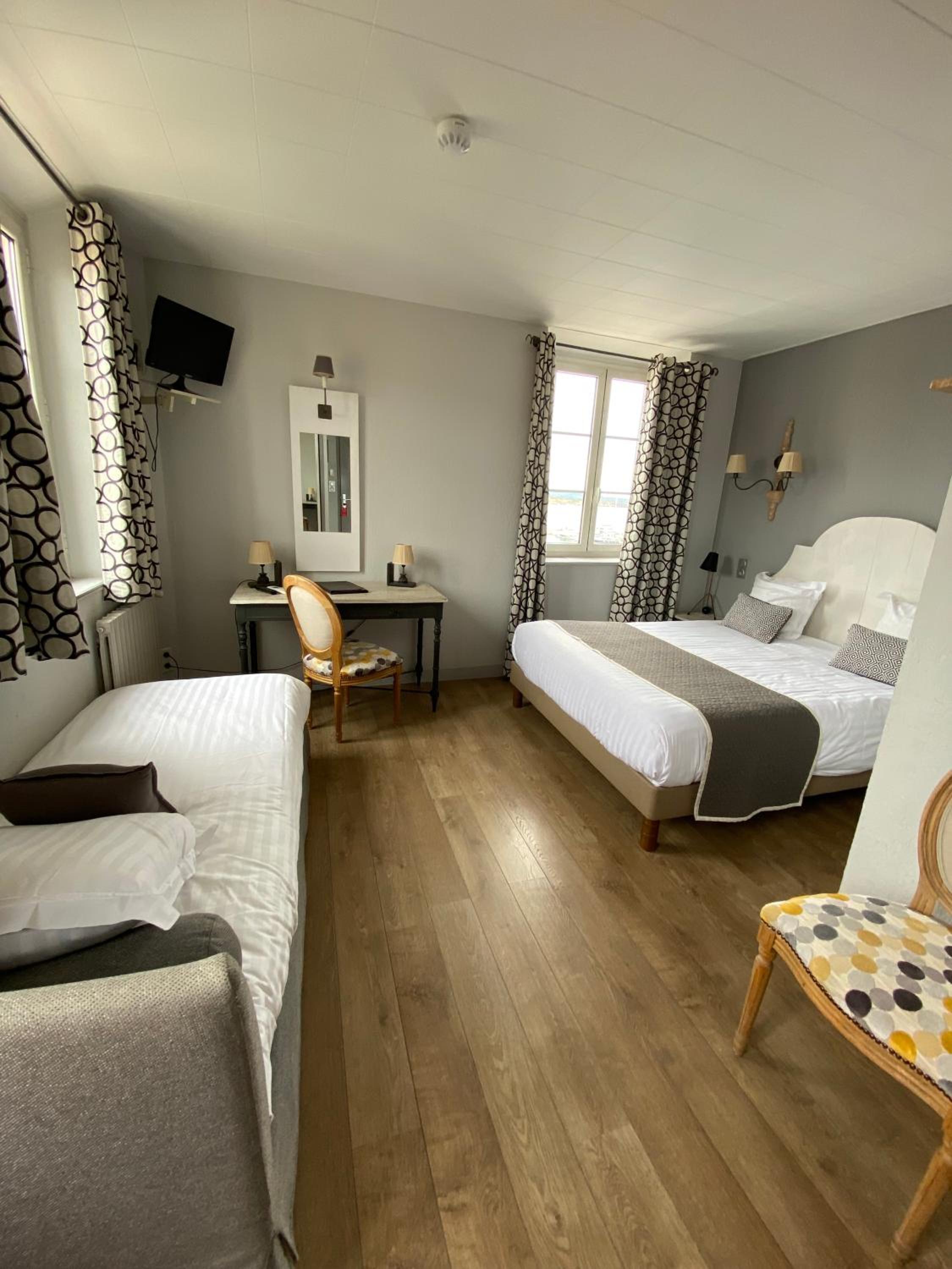 Family Room (2 Adults + 2 Children) with sea and village view