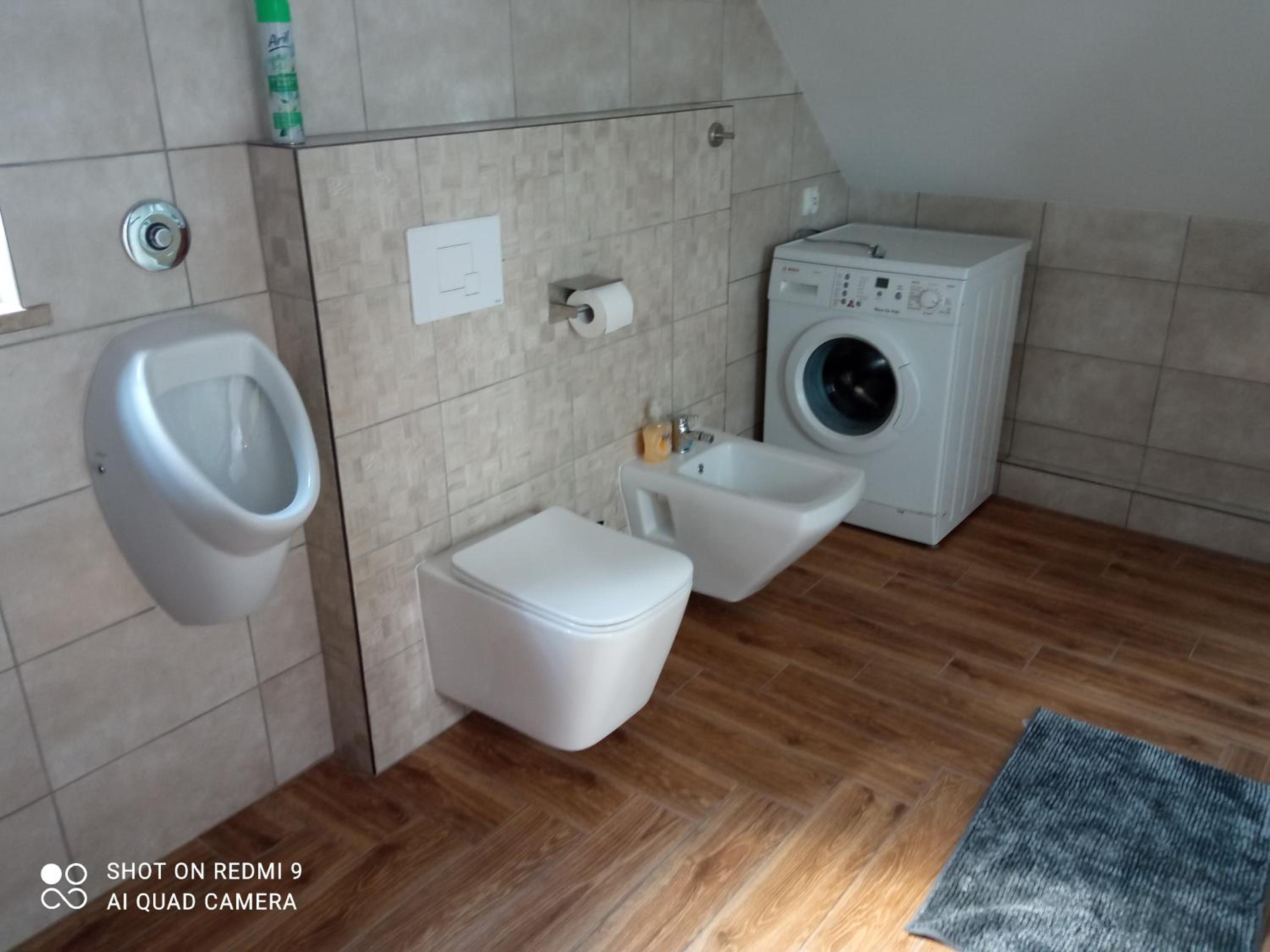 Three-Bedroom Apartment - Photo 19