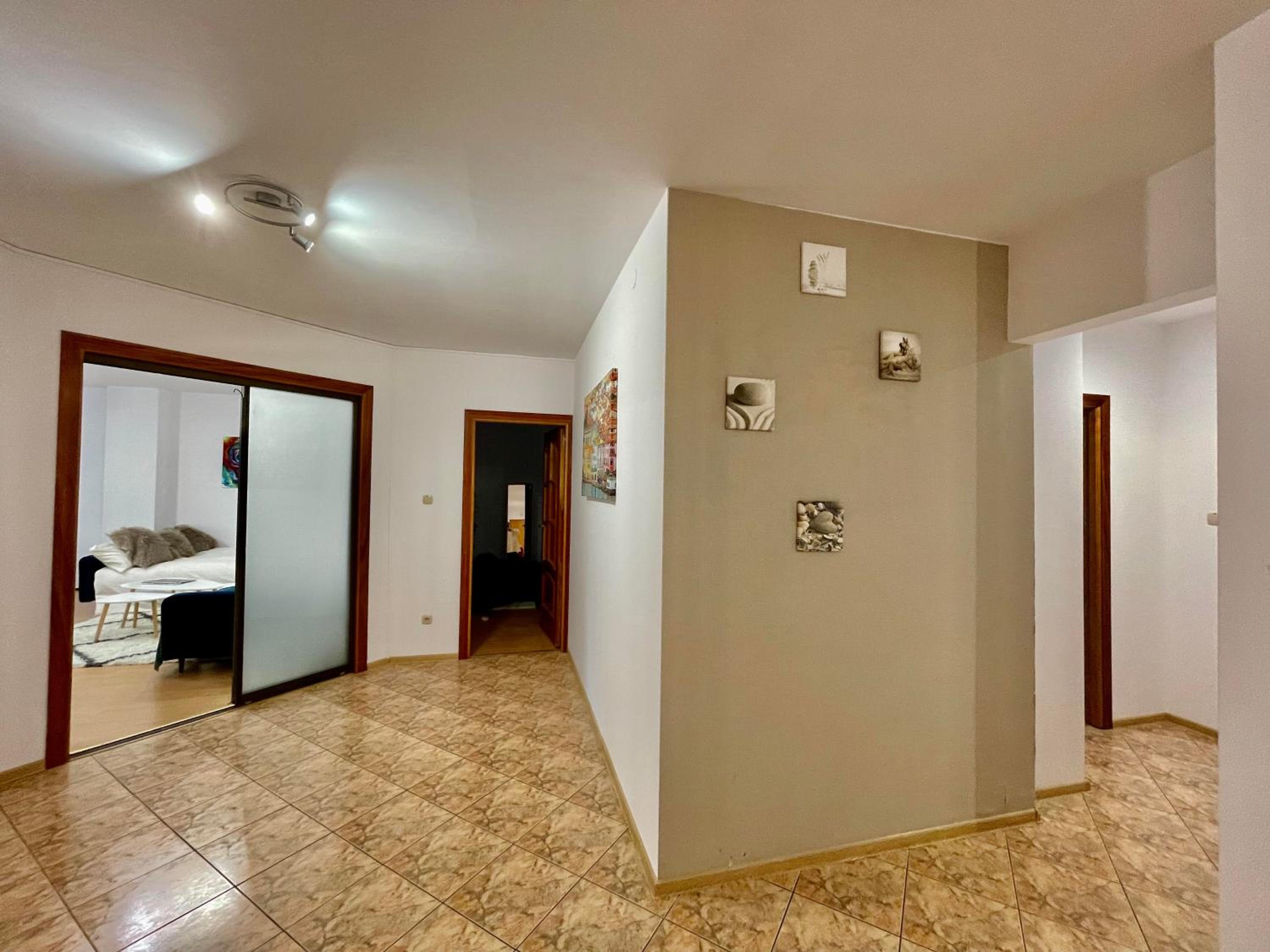 Three-Bedroom Apartment - Photo 14