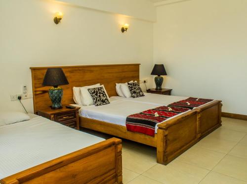 Deluxe Triple Room with Balcony & Sea View