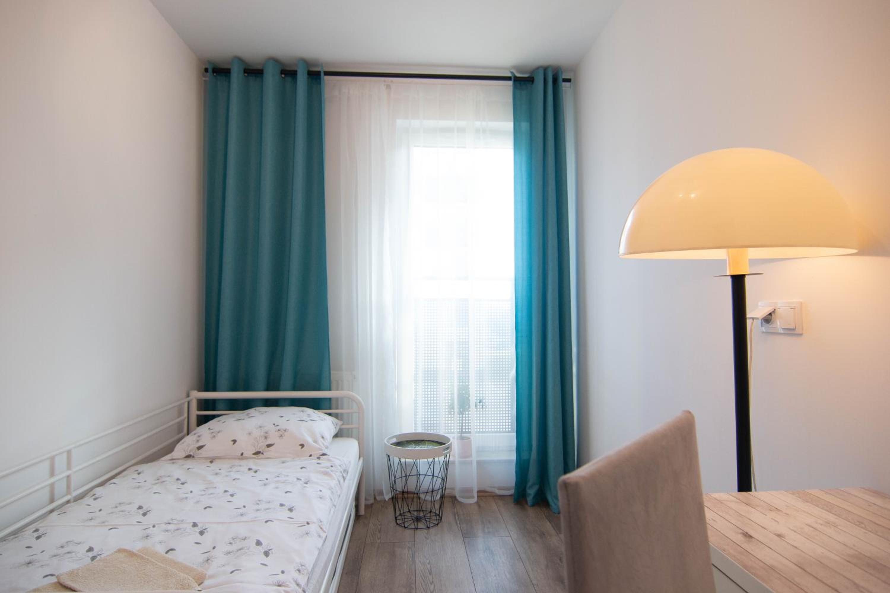 Three-Bedroom Apartment - Photo 13