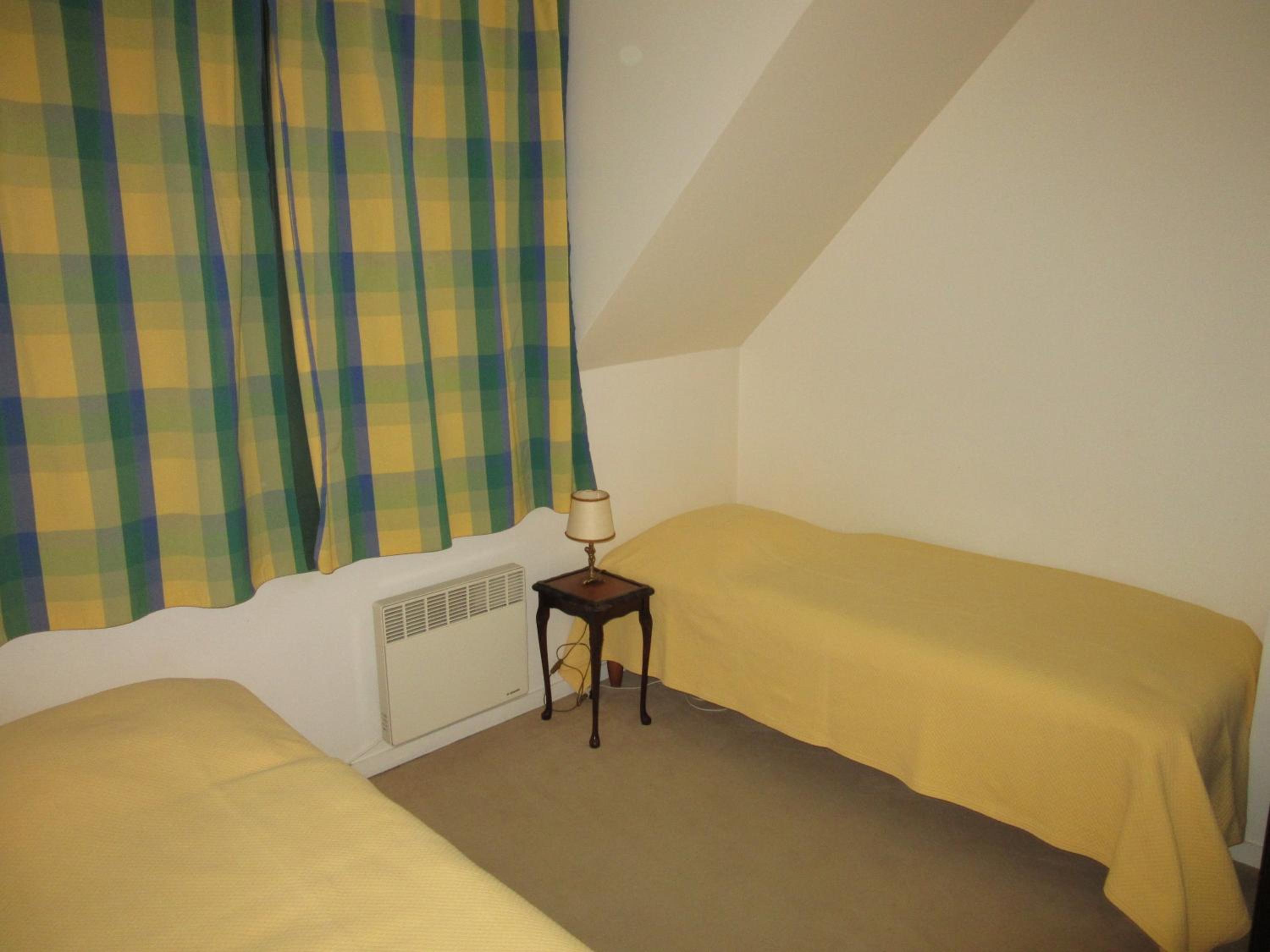 Three-Bedroom Apartment - Photo 18