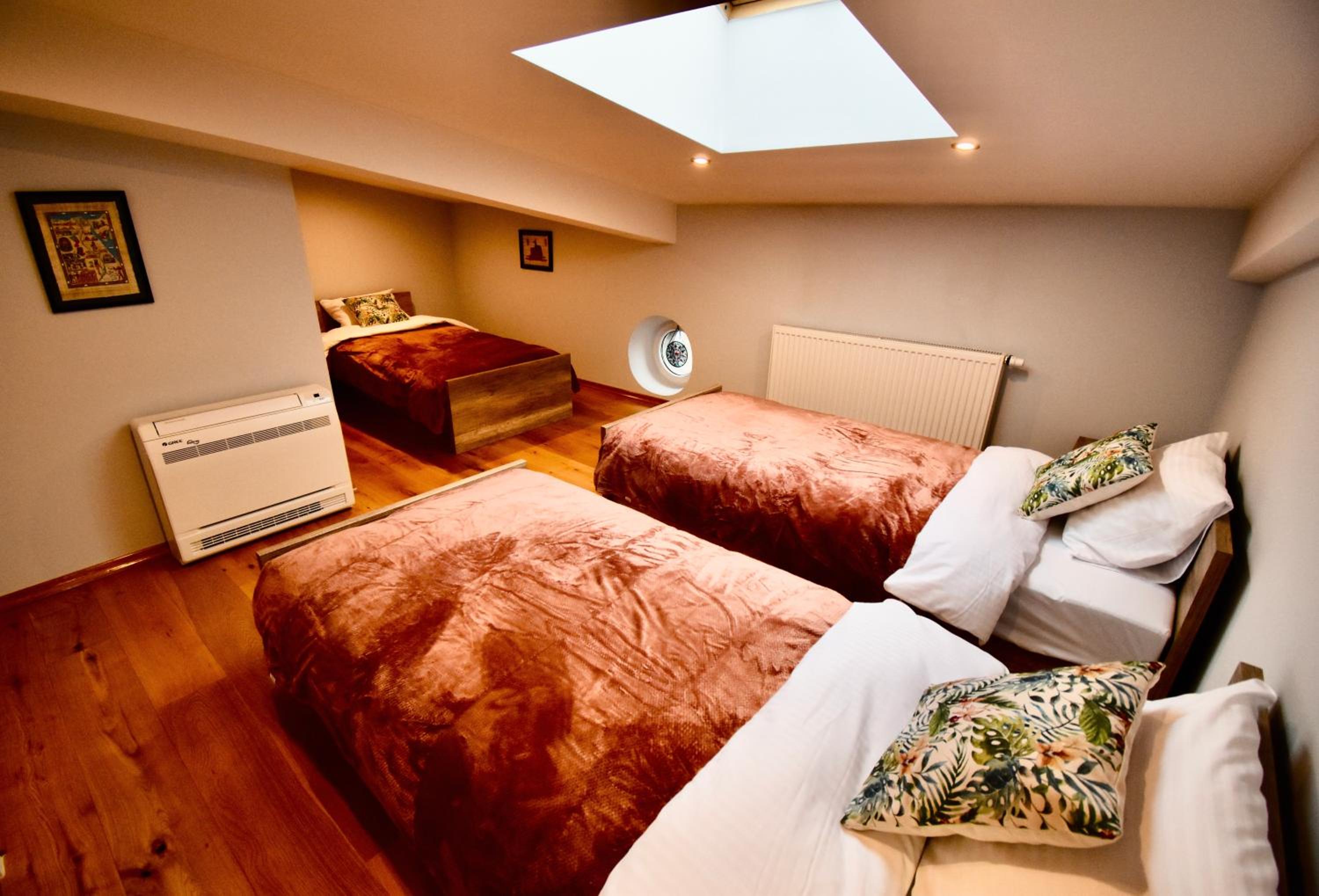 Three-Bedroom Apartment - Photo 12