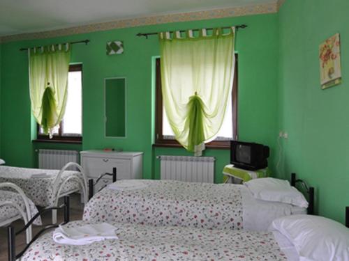 Quadruple Room with Garden View - Photo 1