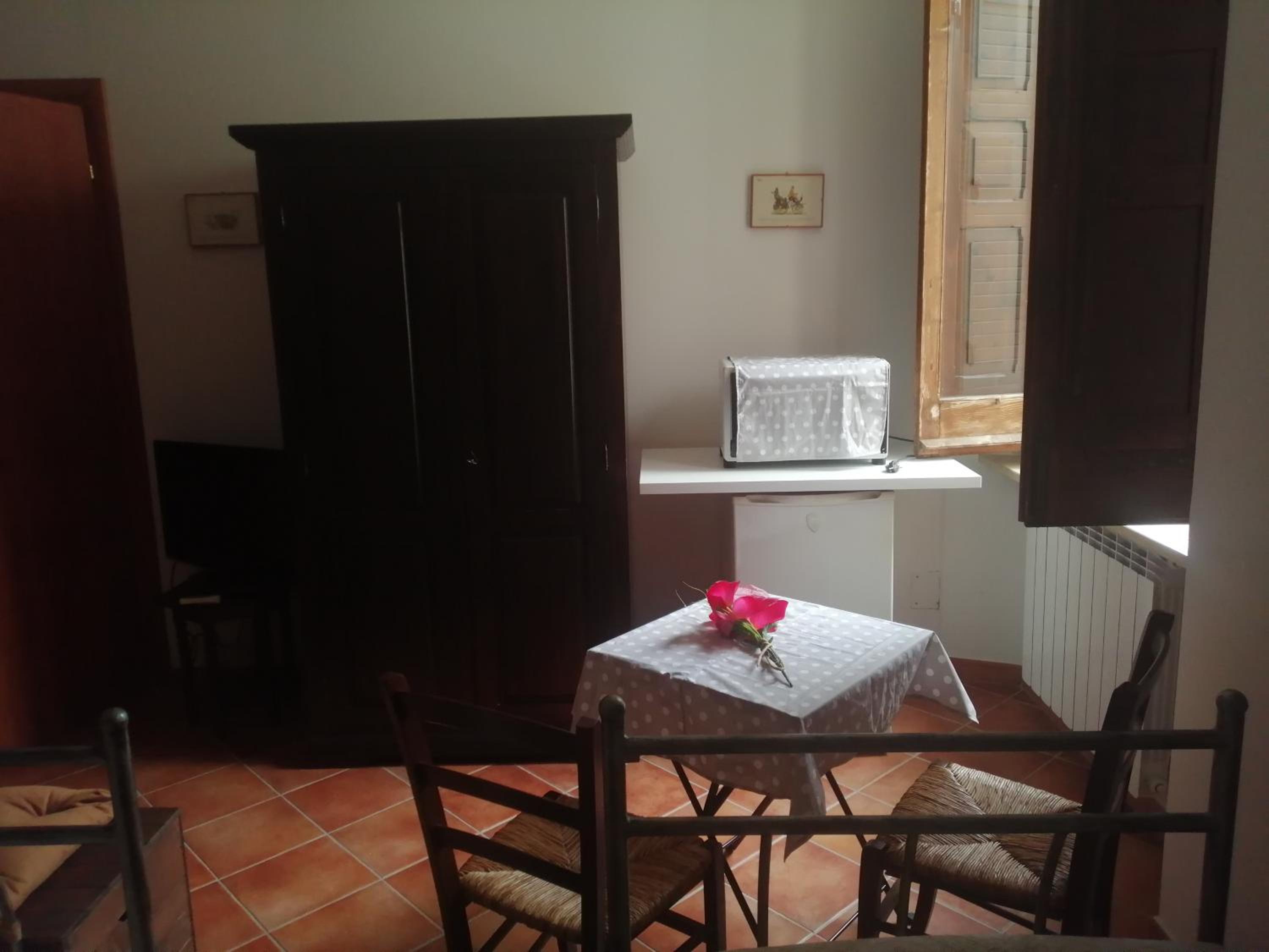 Quadruple Room with Private Bathroom photo 3