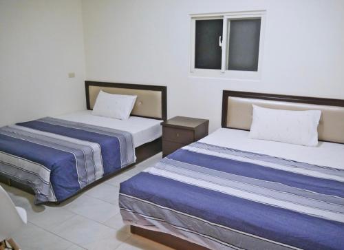 Quadruple Room with Private Bathroom photo 3