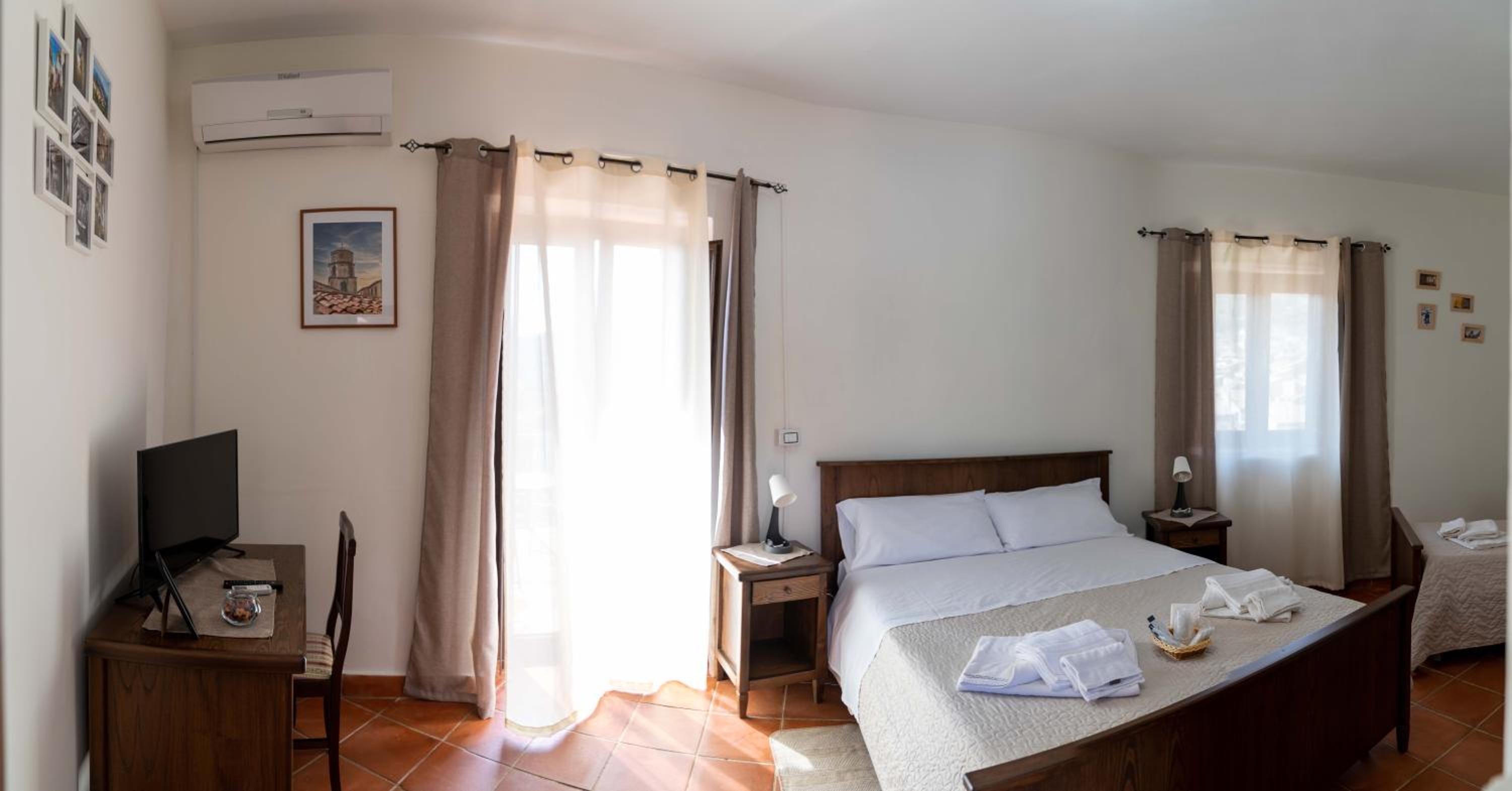 Triple Room with Terrace photo 1