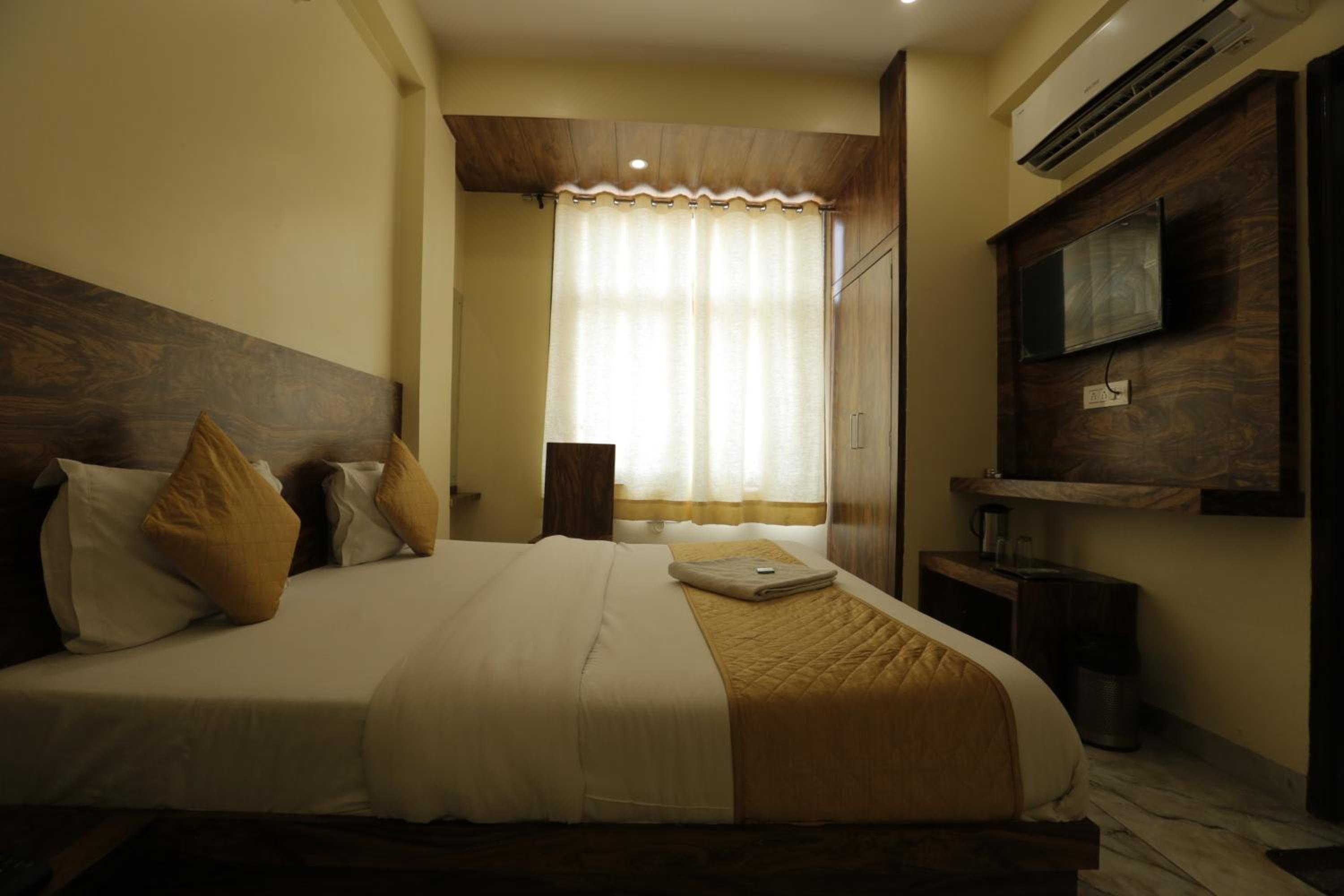 Deluxe Room - Photo 1
