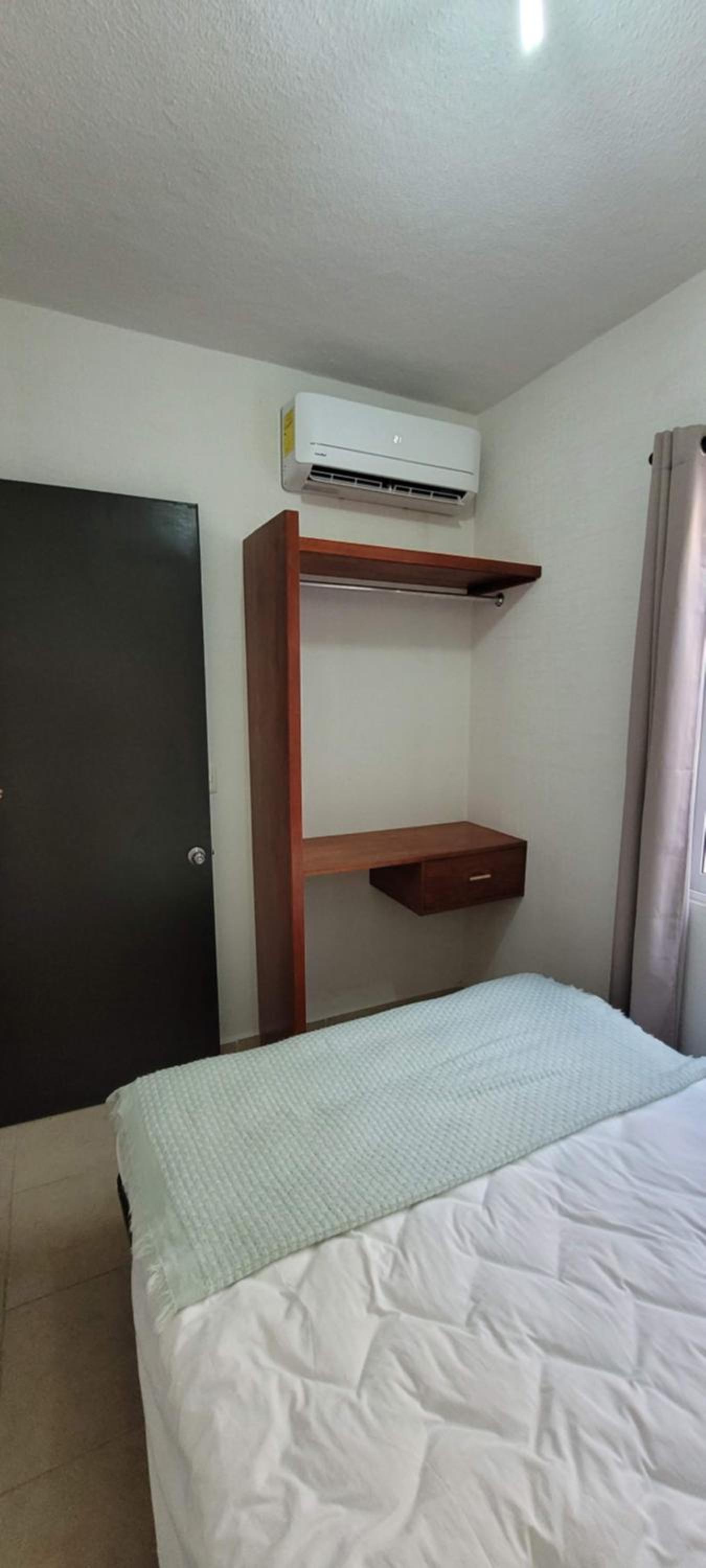 Three-Bedroom House - Photo 25