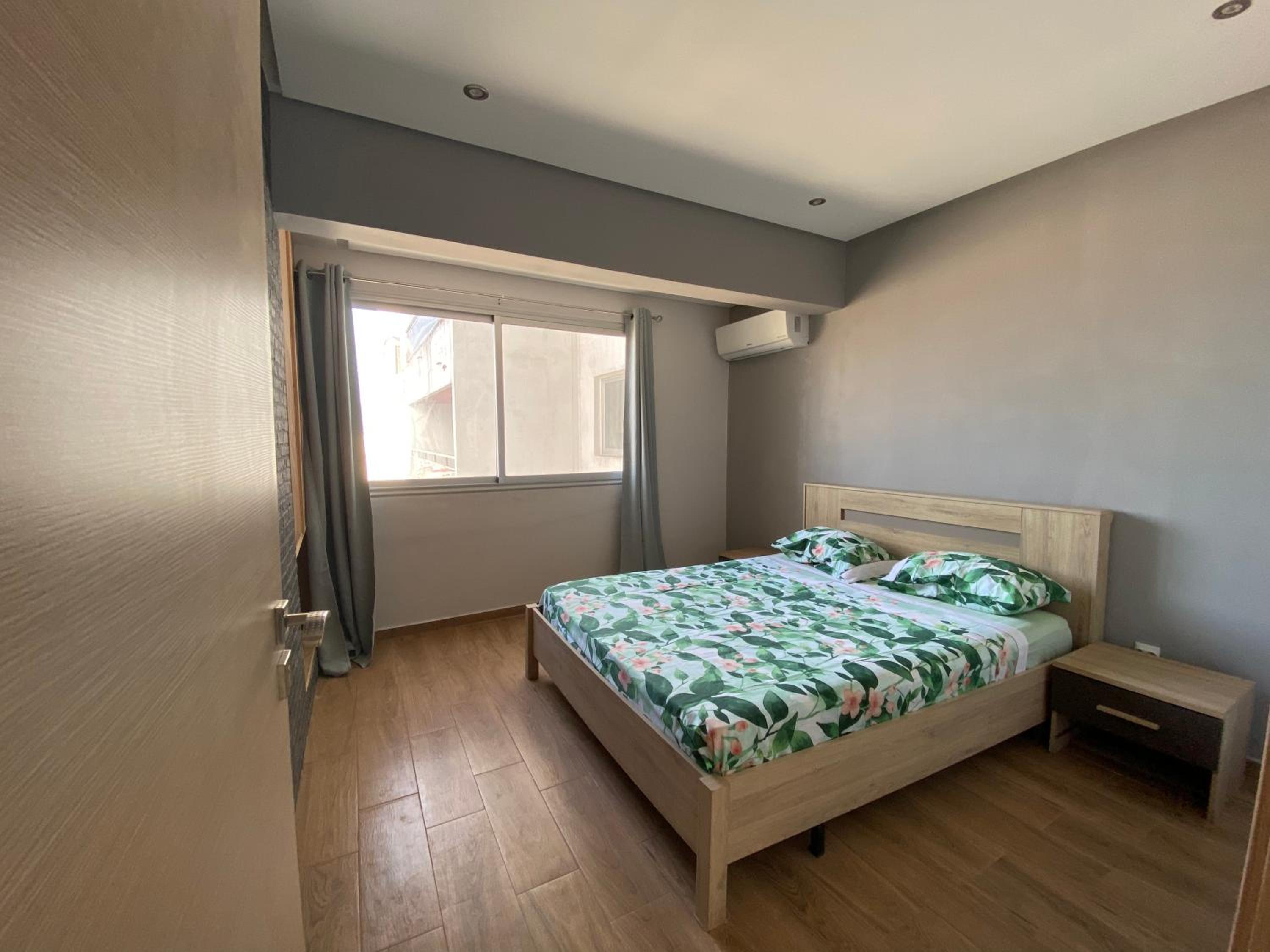 Three-Bedroom Apartment - Photo 19