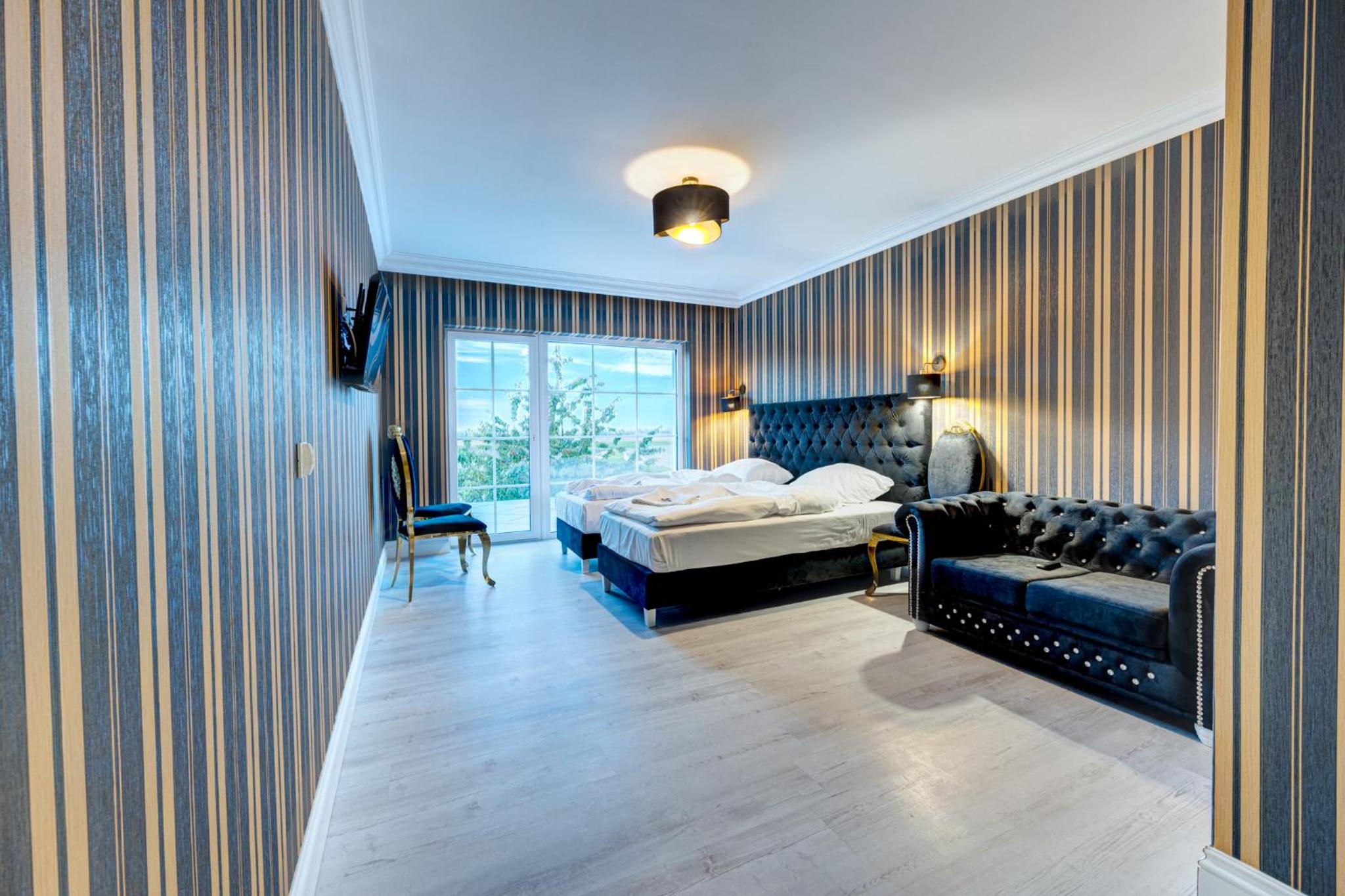 Deluxe Triple Room - Photo 1