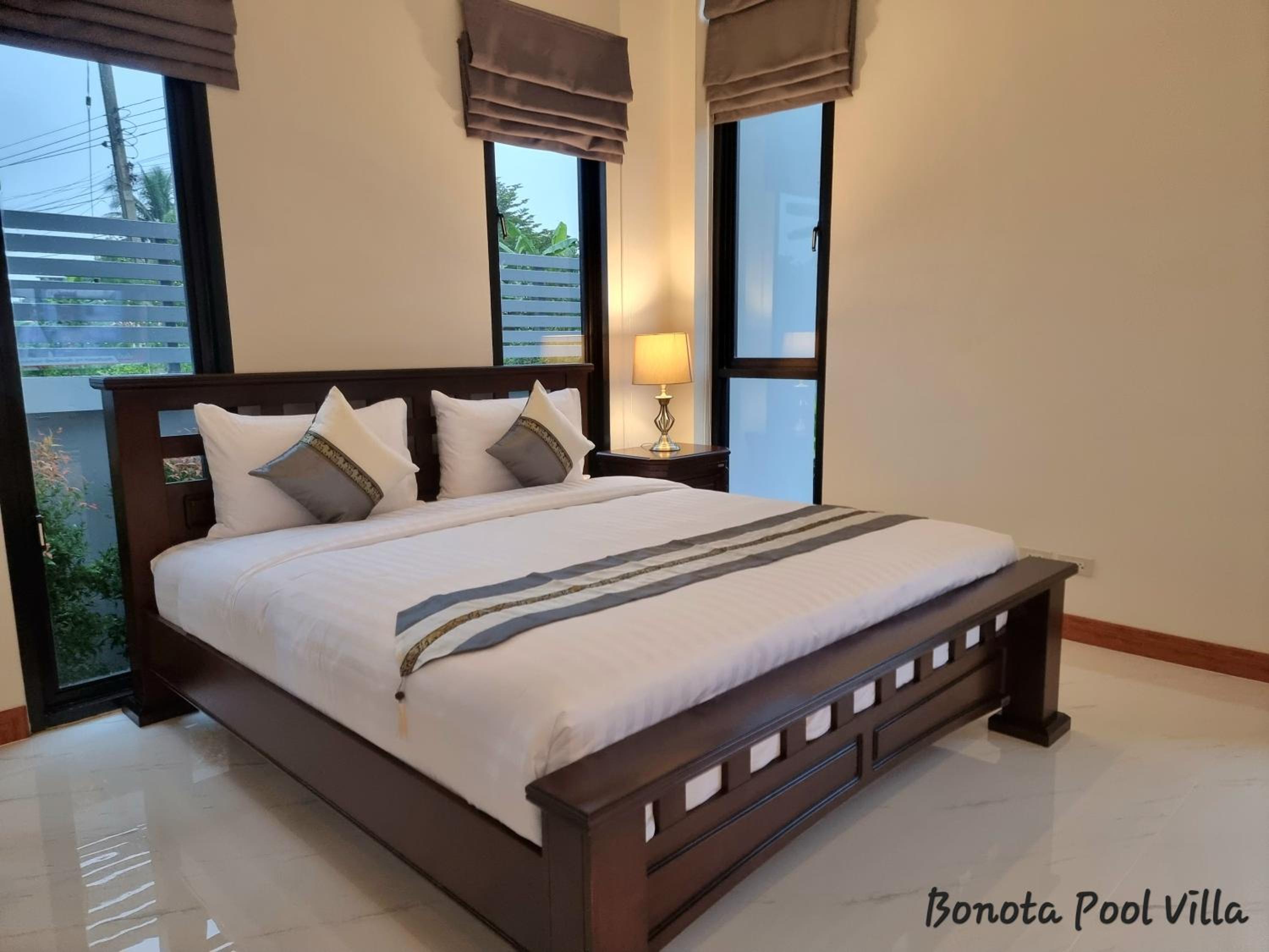Four-Bedroom House - Photo 27