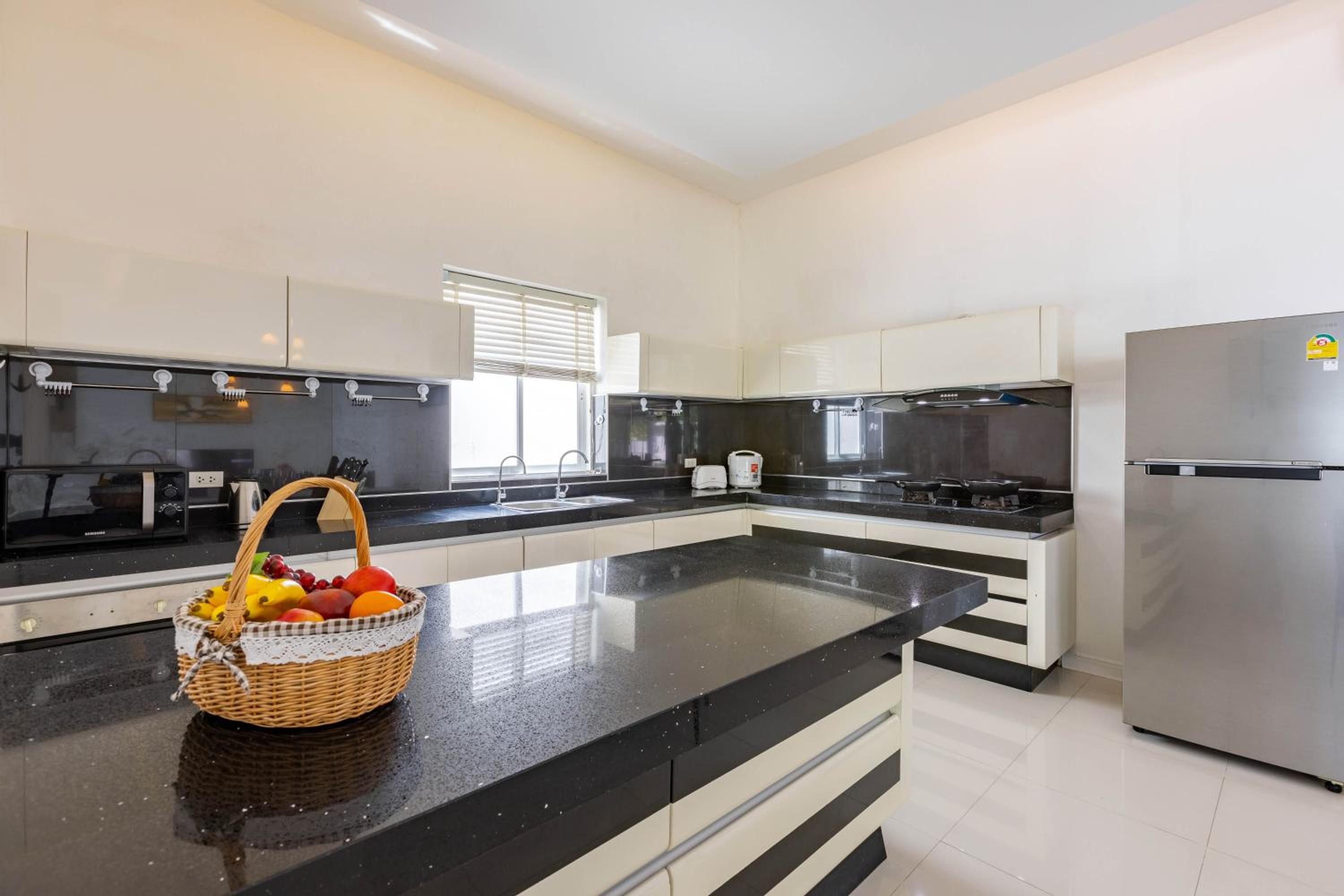 Three-Bedroom House - Photo 19
