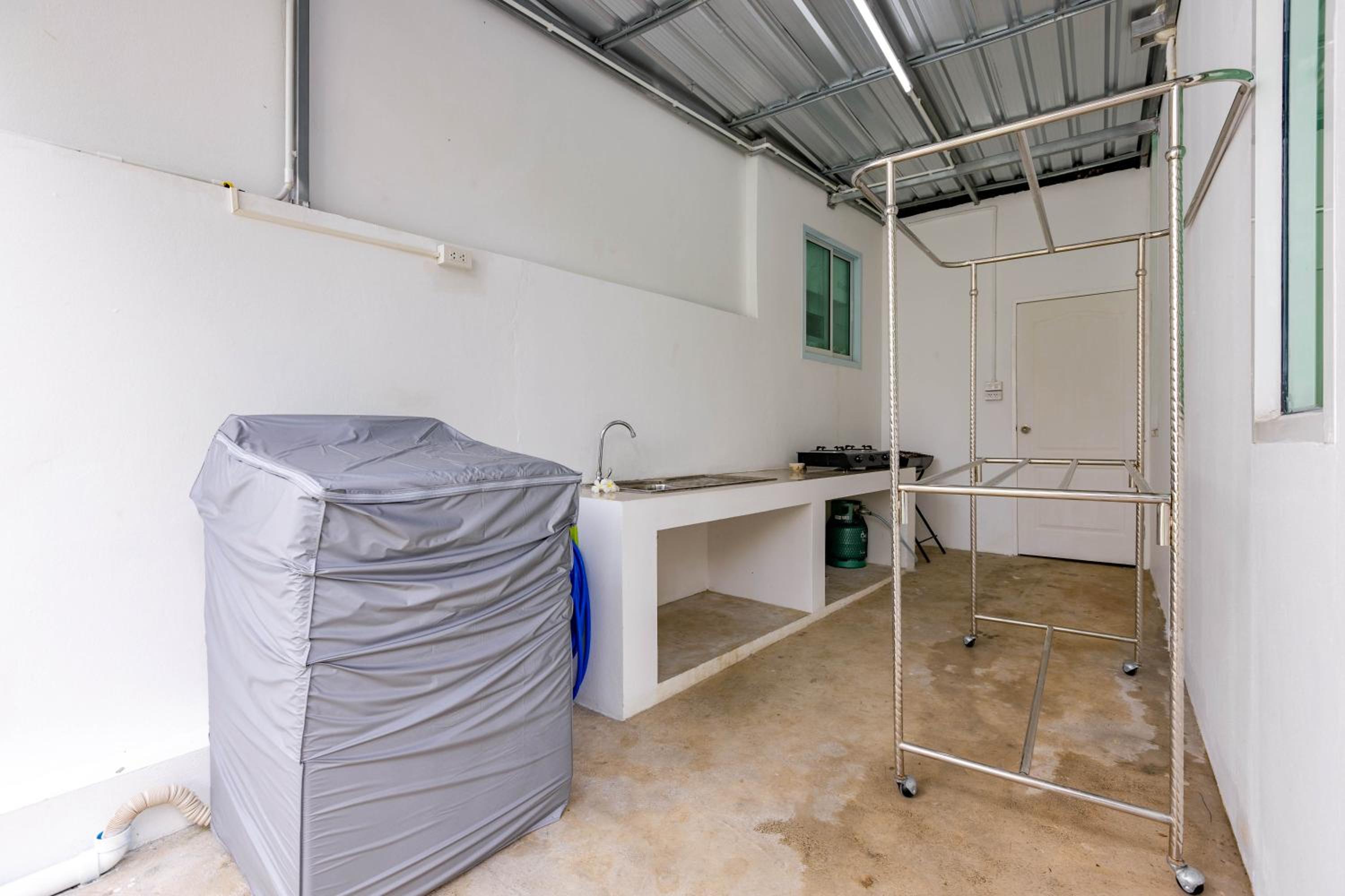 Three-Bedroom House - Photo 22