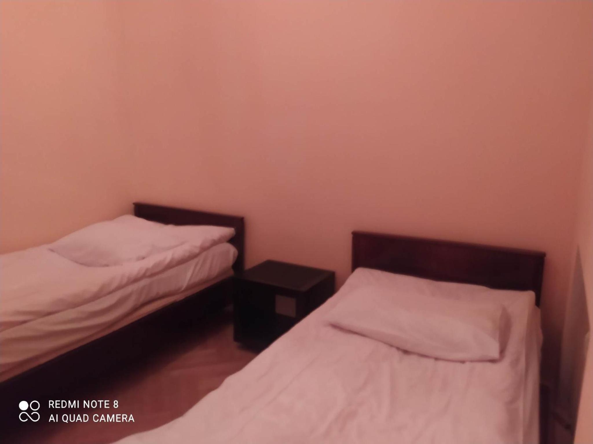 Quadruple Room with Private Bathroom