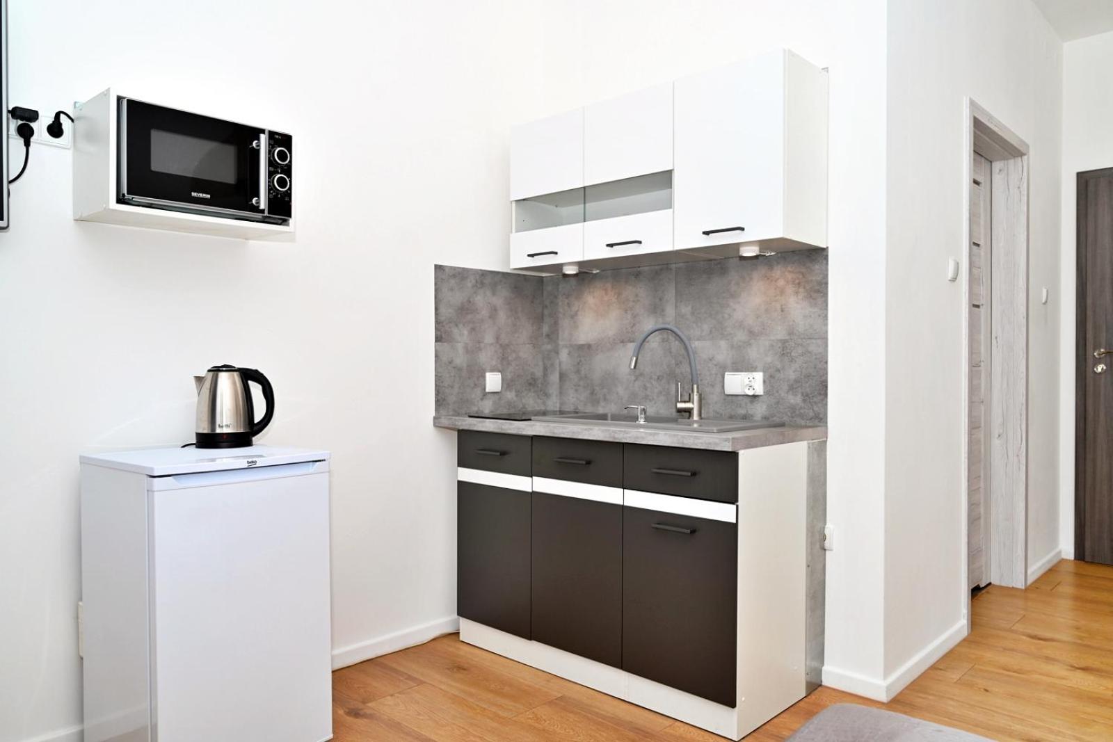 Apartment with Balcony - Photo 2