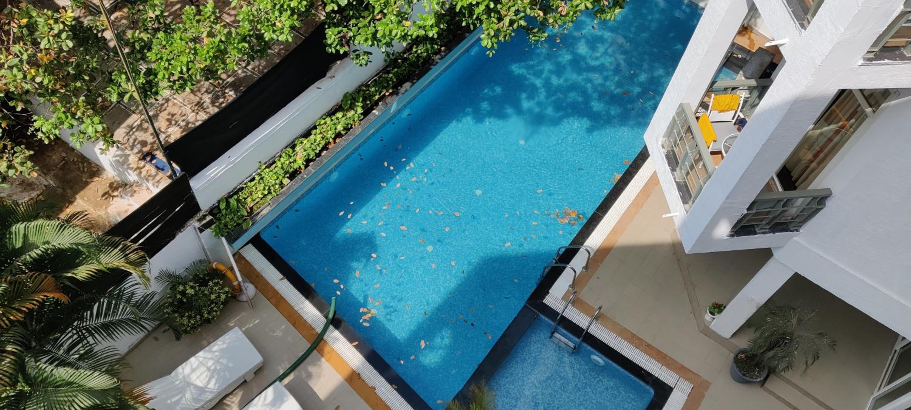 Study room with balcony and pool view