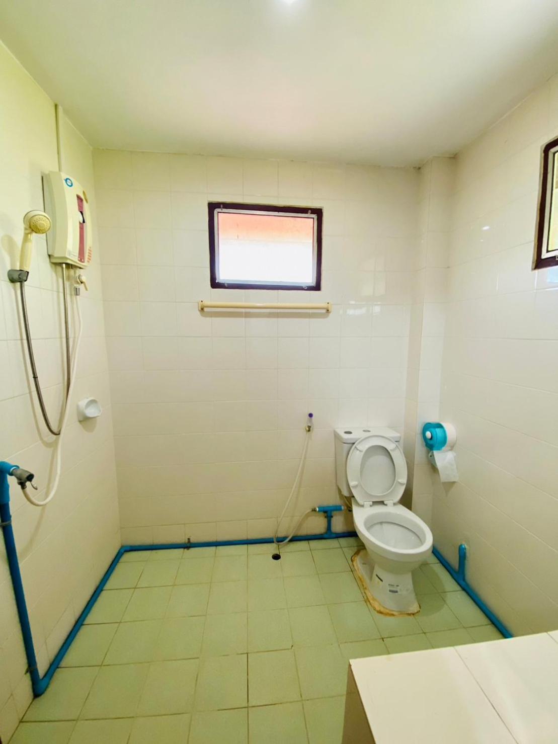 Three-Bedroom House - Photo 12