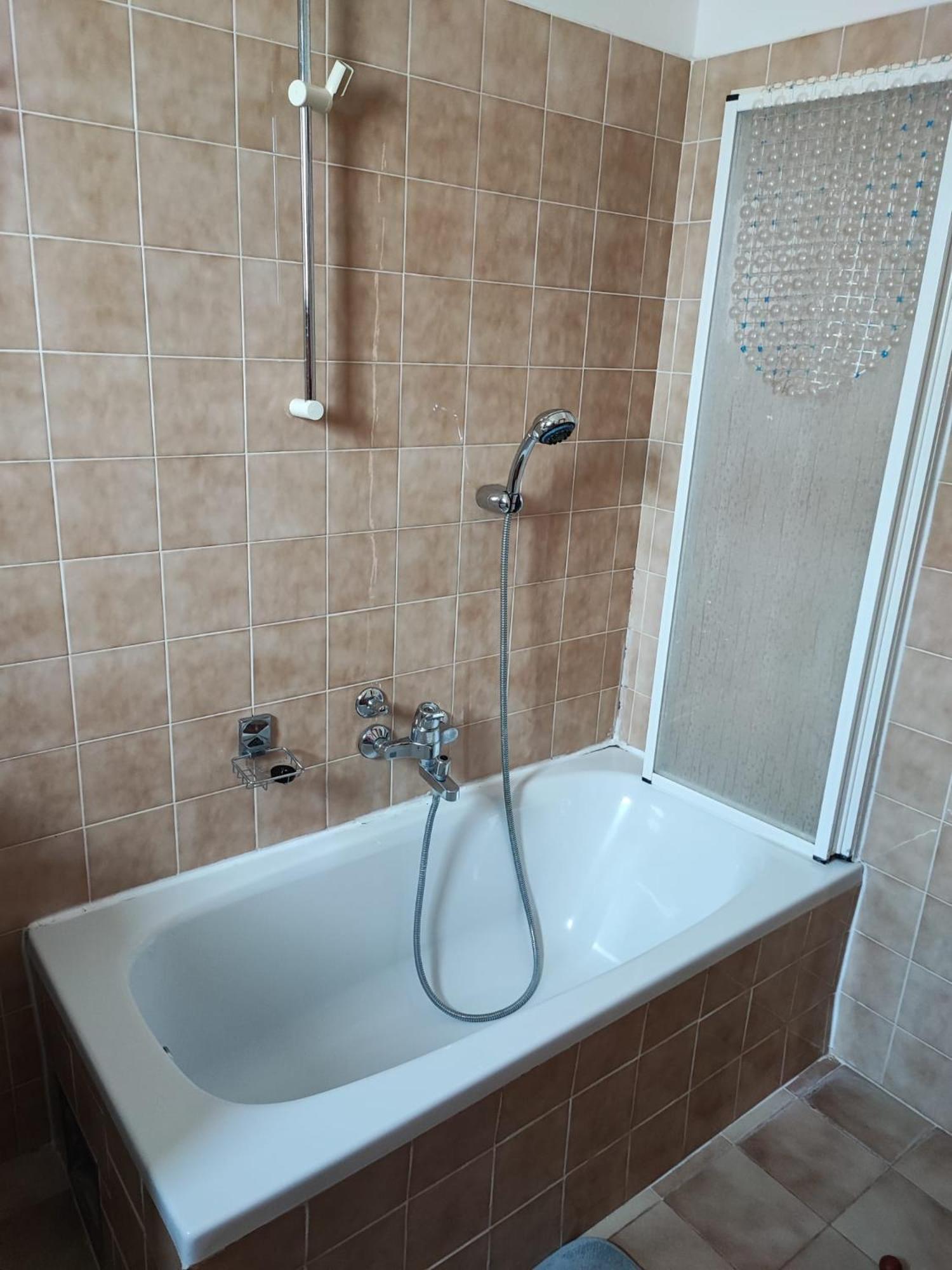 Three-Bedroom Apartment - Photo 18