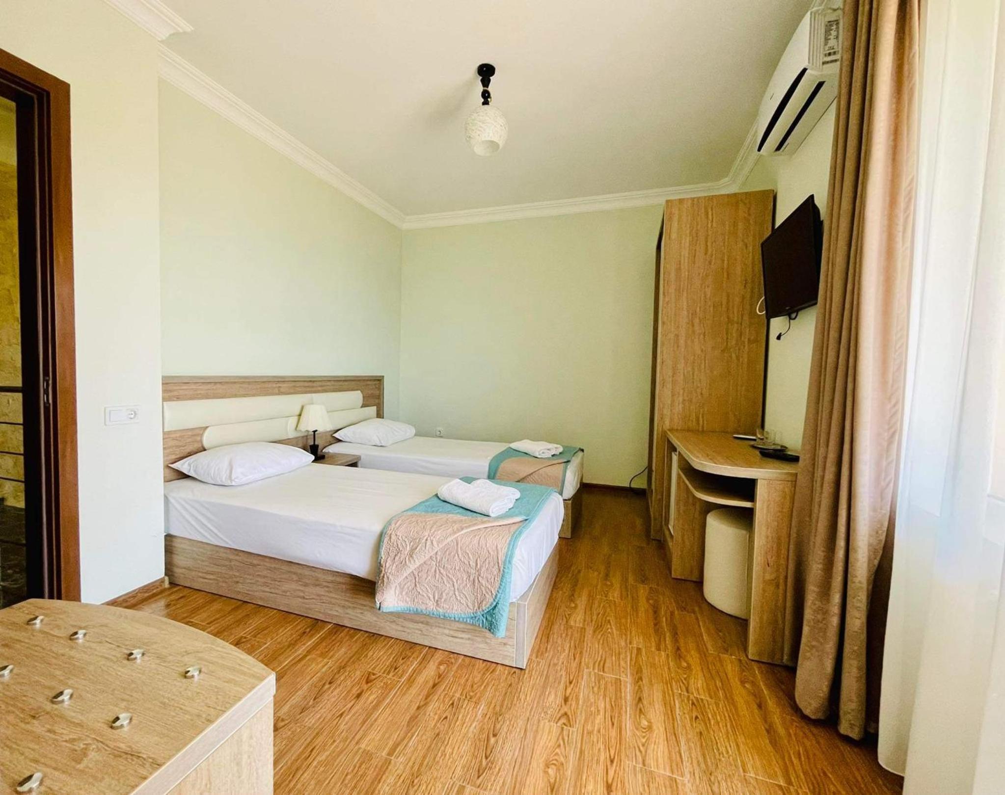 Double or Twin Room with Side Sea View