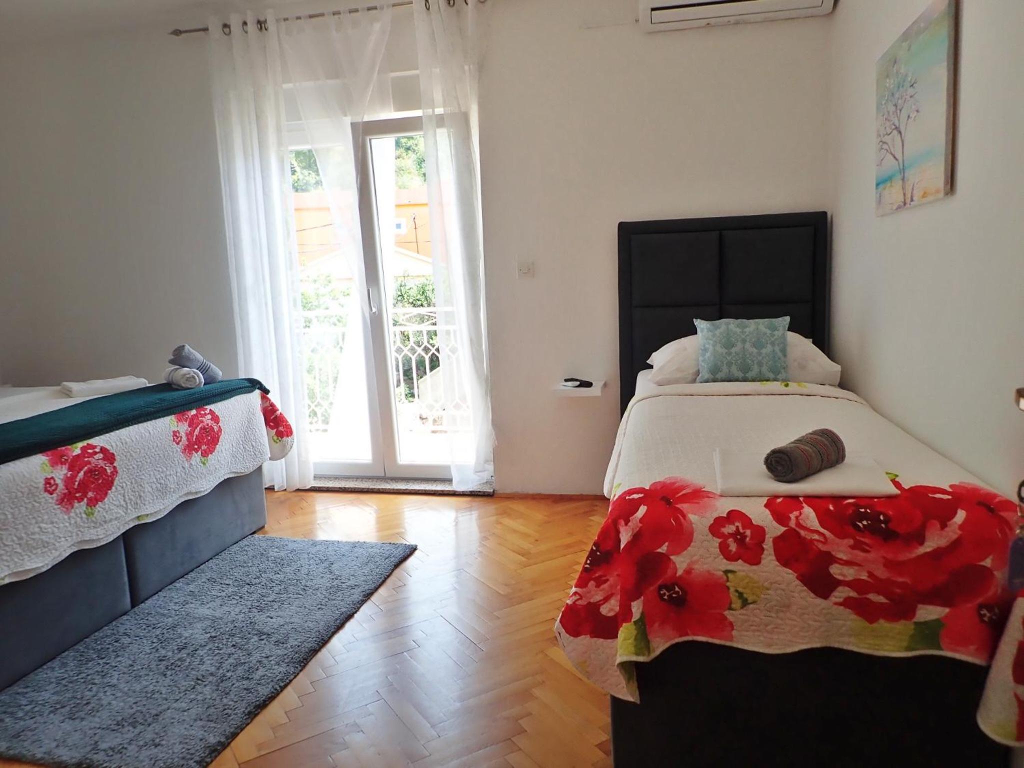Three-Bedroom Apartment photo 2
