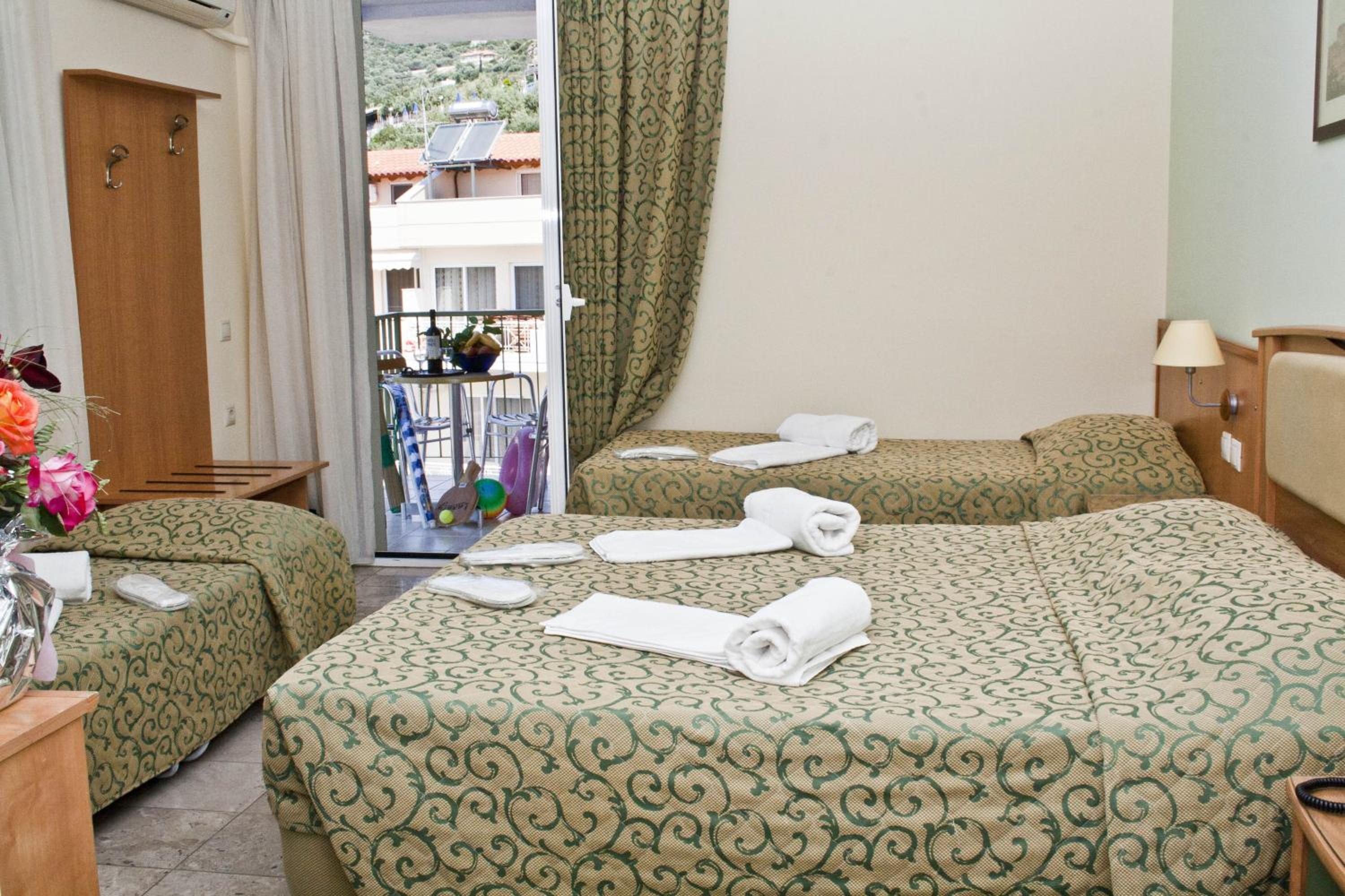 Quadruple Room (3 Adults + 1 Child)