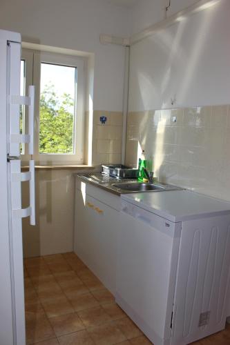 Apartment with Balcony - Photo 18